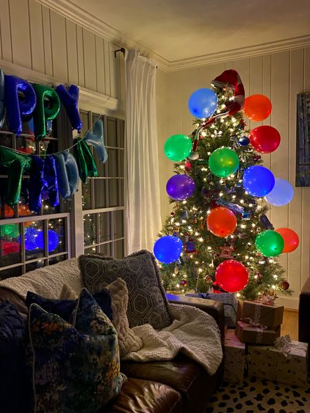 We have a December birthday! Every year his elf puts light up balloons on our Christmas tree. 

#LTKfamily #LTKHoliday #LTKparties