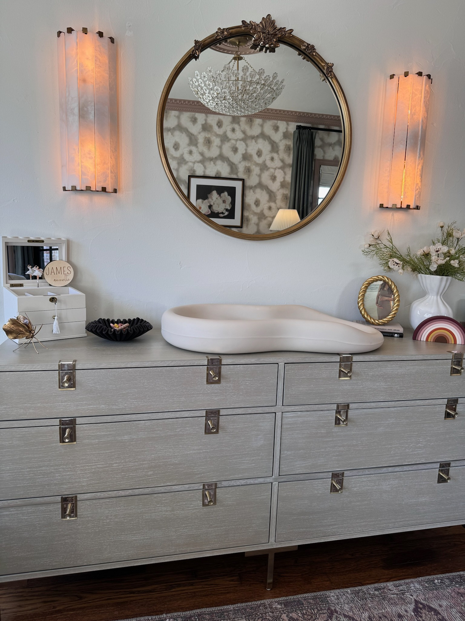 The mirror and moody lighting elevate the nursery 🤍✨



#LTKKids #LTKHome #LTKFamily