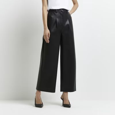 Black faux leather pleated culottes | River Island (UK & IE)