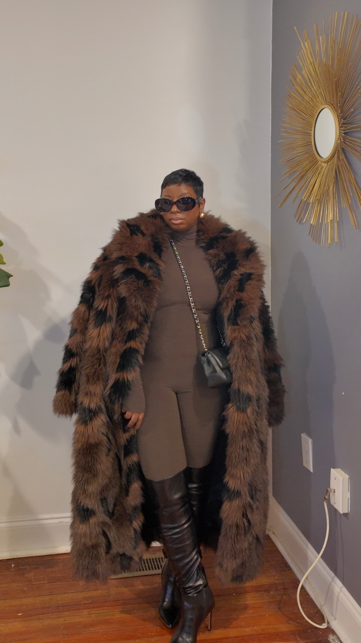 Love this Morma Kamali jumpsuit. Size down One size