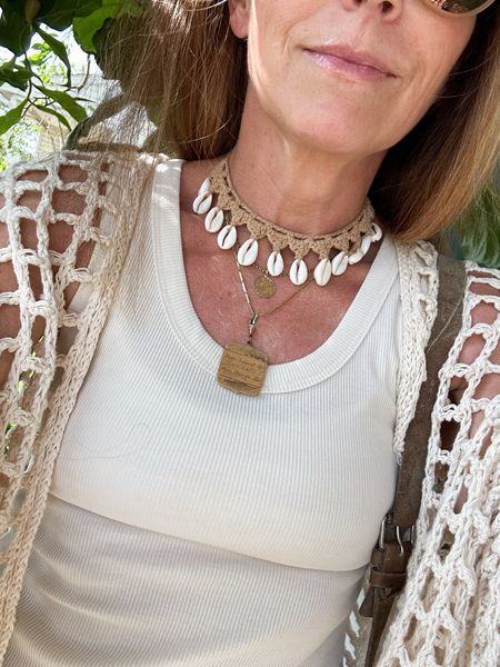 This is my favorite combo to wear in the summer, love this seashell necklace under $10 paired with my favorite gold necklaces 

#LTKStyleTip #LTKSaleAlert #LTKOver40