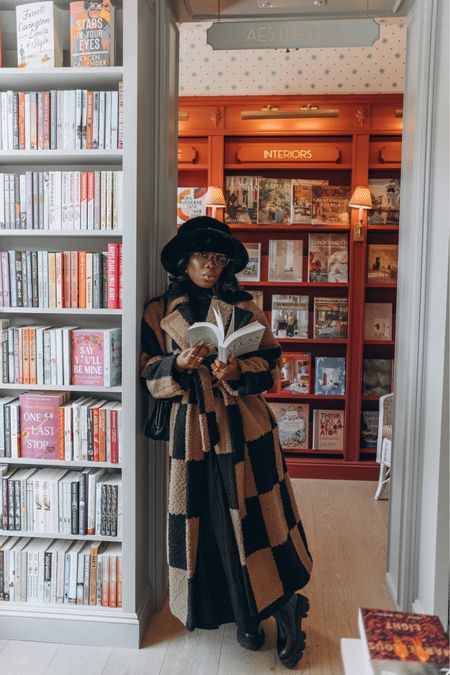 Channeling my inner grandma in this checkered maxi coat and faux fur hat. Gigi Pip hat is currently on sale. 

#LTKsalealert #LTKstyletip