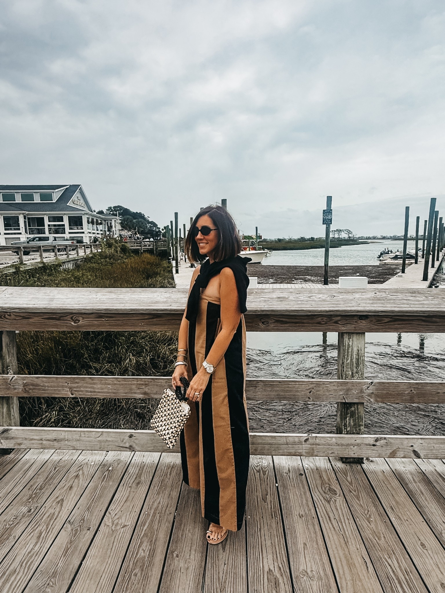 What I wore on the Marsh walk at Murrells Inlet, South Carolina 🖤🐚🌊

I Pack this jumper everywhere! I threw a cardigan on my shoulders since it was chilly out, but so comfortable — I do always need to give it a quick steam, but otherwise it’s good to go! Sleeveless, has pockets, flowy and a nice linen-like material //

**size small in all
*** beaded purse is on sale for $12

#Amazon #AmazonFashion #CasualDressyStyle #VacationStyle #NeutralStyle #FashionOver40 

#LTKOver40 #LTKStyleTip #LTKFindsUnder50