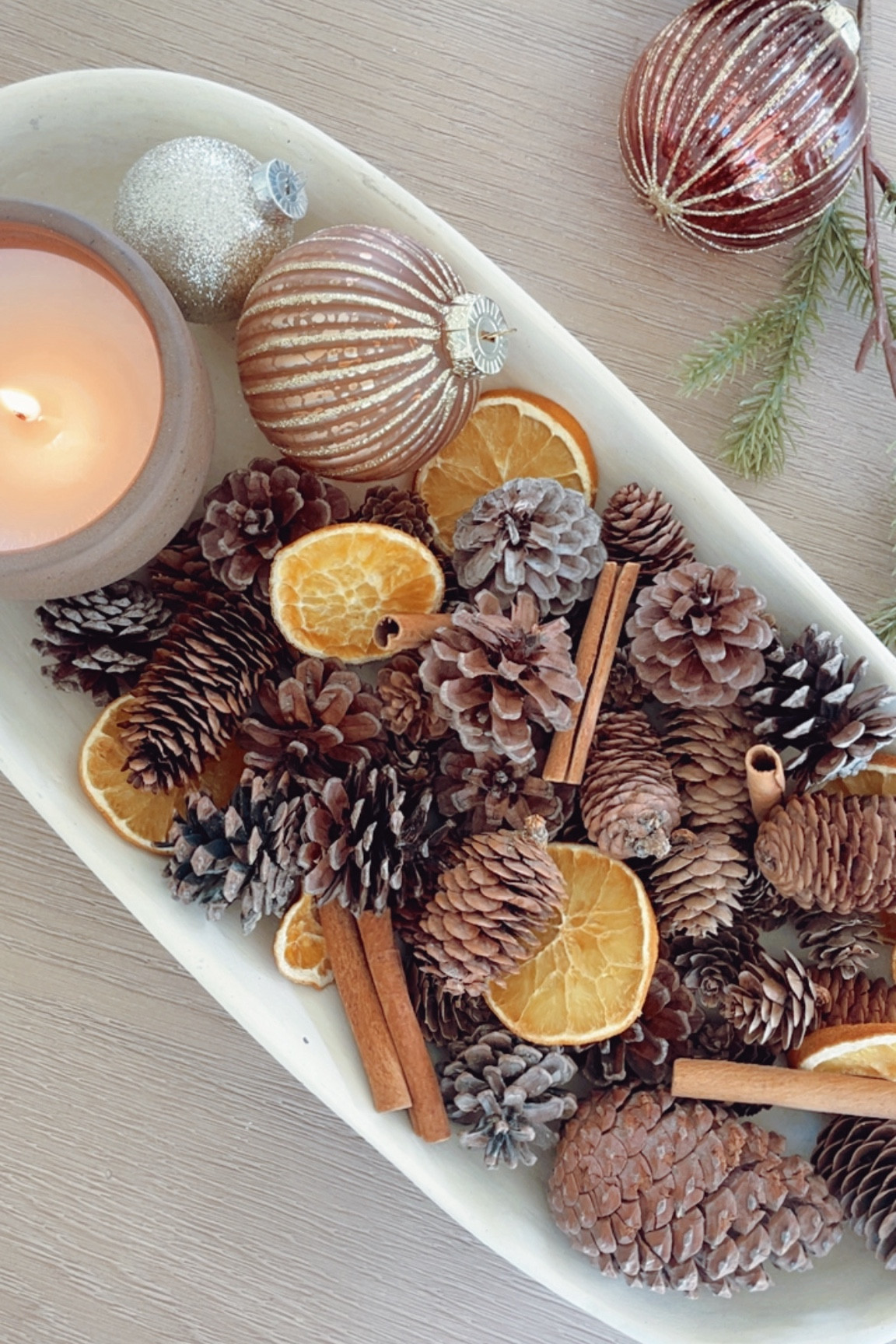 Easy holiday centerpiece display perfect for a dining table, console table or coffee table! 

#LTKHoliday #LTKSeasonal #LTKHome