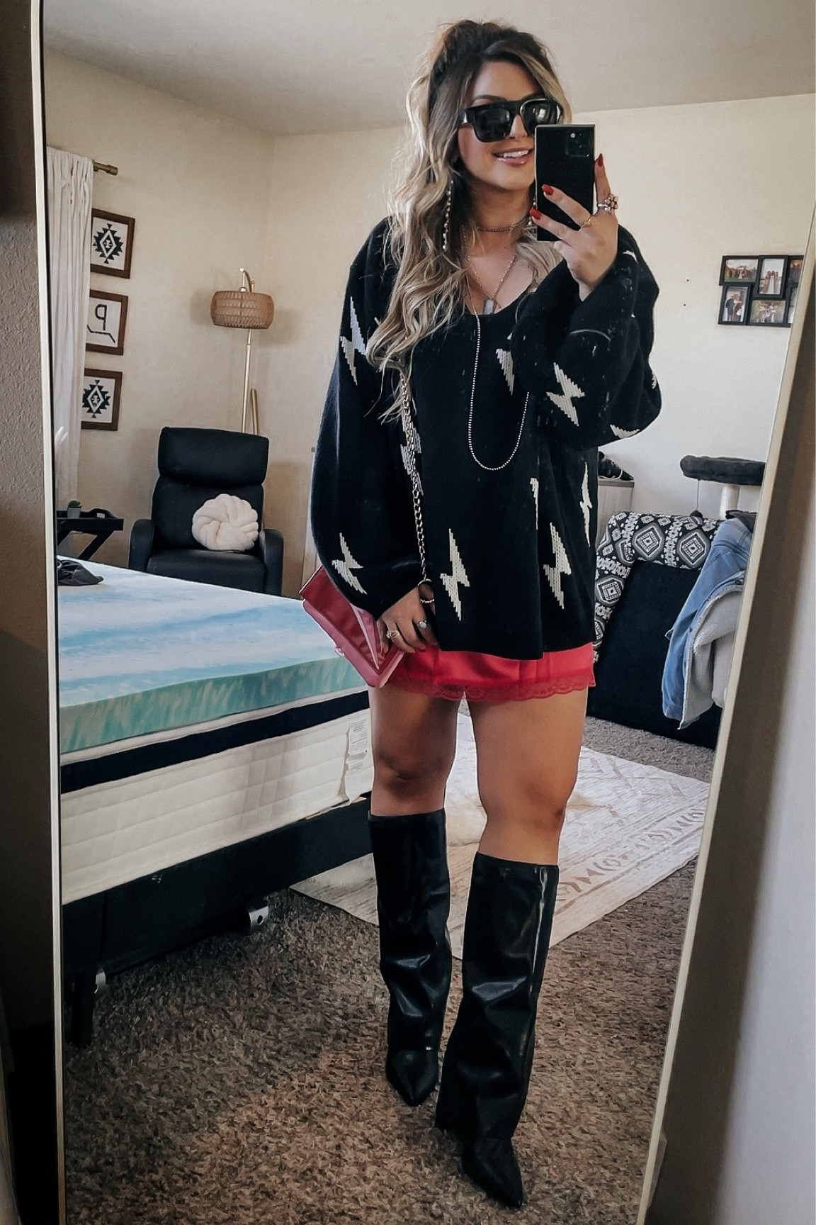 Oversized Sweater Outfit ✨ 

Ride the lightning vibes today! I’ve done lace under an oversized shirt…but I think the oversized sweater is even better! 

Sweater: Dressed in Lala
Skirt + Boots: Amazon
Sunnies: Versace
Jewelry: The Desert Daisy Co. + Nizhoni Traders + Hippie Cowgirl Couture 
Bag: Betsy Dare

#LTKmidsize #LTKfindsunder50 #LTKstyletip