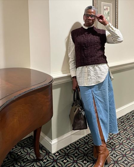 Cable-knit sweater vest in solid color
Mock turtleneck and cap sleeves

Universal Thread solid-color button-down shirt
 cotton 
Full-length button-down front
 and long sleeves
Oversized fit 

Universal Thread medium-wash denim maxi skirt
cotton with spandex 


#LTKstyletip #LTKfindsunder50 #LTKworkwear