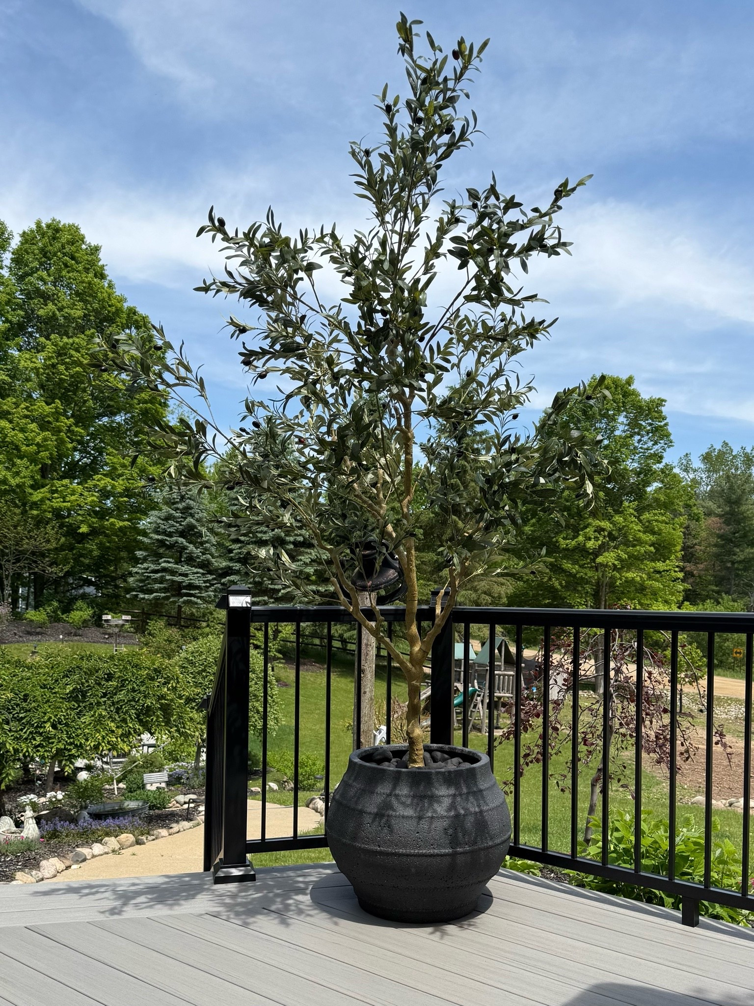 On Sale 8’ Olive Tree. 
Follow @farmtotablecreations on Instagram for more home and outdoor finds.

This 8’ faux UV resistant olive tree gives that high-end designer look without the maintenance… and it’s currently on sale 🙌🏼 The oversized planter is also BOGO 50% off which makes this such a good time to refresh an outdoor space for summer. Love how realistic the branches and olives look styled on the deck.

#olivetree #outdoordecor #patiodecor #planters #amazonhome

olive tree | faux olive tree | outdoor olive tree | uv resistant decor | patio styling | deck decor | outdoor planters | summer patio | designer look for less | neutral outdoor decor | patio refresh | outdoor living | amazon outdoor finds | porch decor | backyard inspiration | large planter | faux tree decor | outdoor styling ideas | luxury outdoor decor | patio inspiration | home styling | outdoor entertaining | deck styling | elevated outdoor living | summer home finds

#LTKHome #LTKSaleAlert