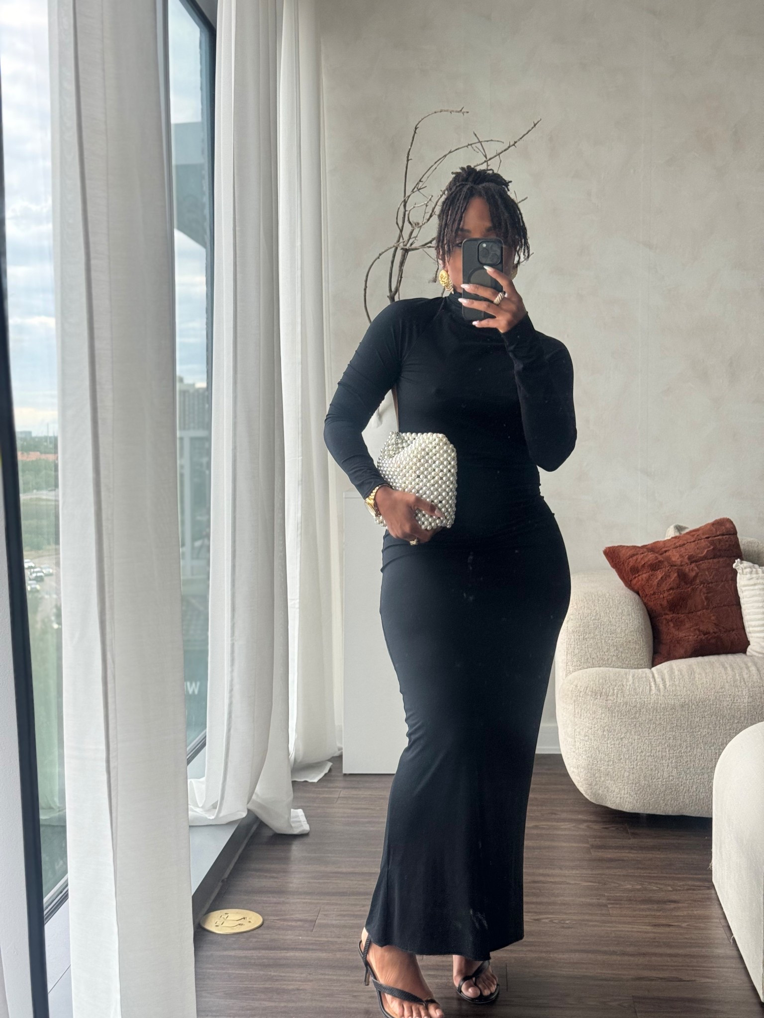 Day 17 .. I love  a good LBD dress that can transition from season to season. This Lenny dress from @thelinebyk was a great addition to my soft minimal wardrobe . I’m wearing a size medium . 

Right on time ... I’m stepping out for an all black affair . 

Earring: @juliavaughn
Bag old Zara 

#LTKMidsize #LTKSeasonal #LTKStyleTip