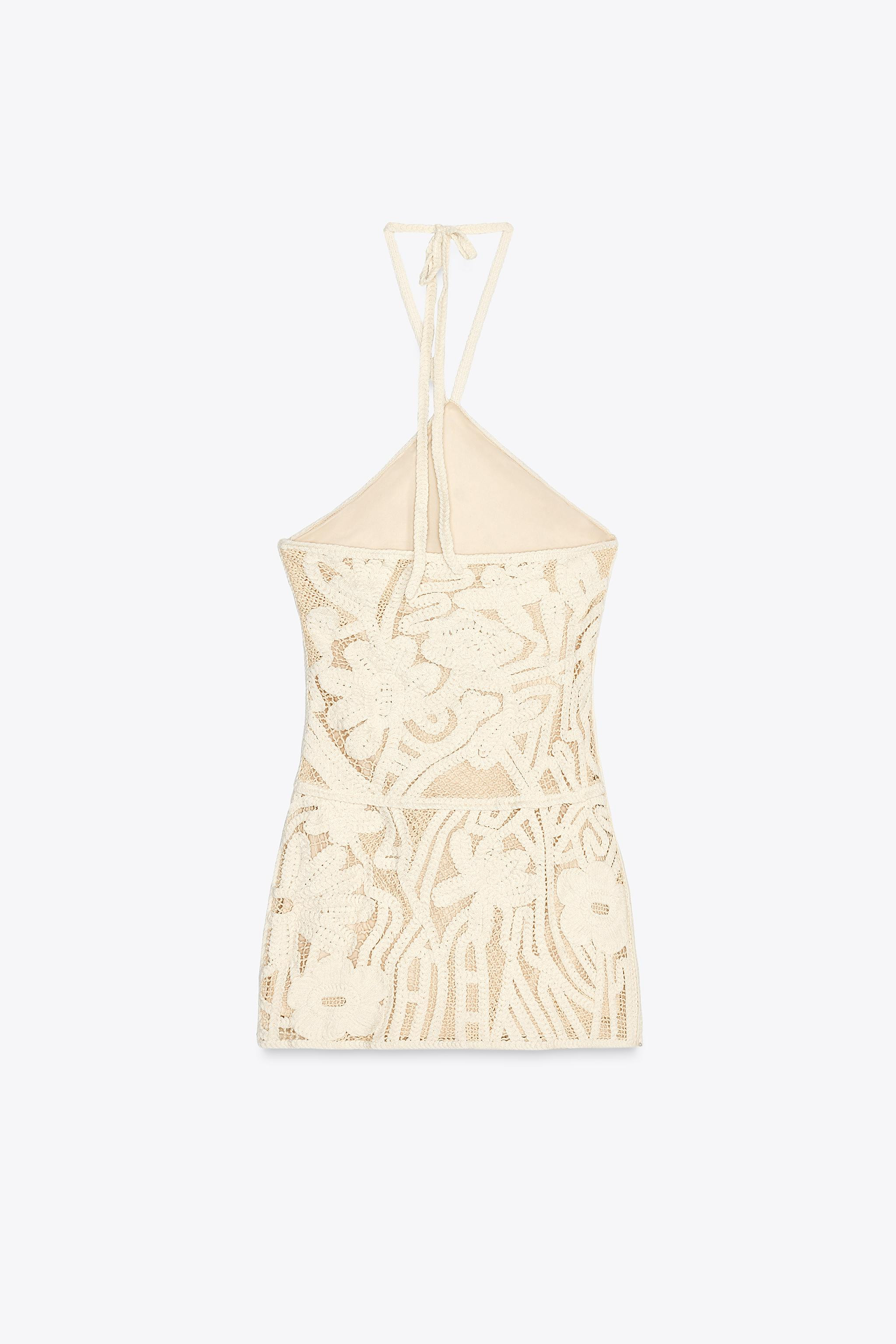 Halter neck dress with adjustable ties. Featuring tonal embroidery and an open back.Straw | 5070/... | Zara UK