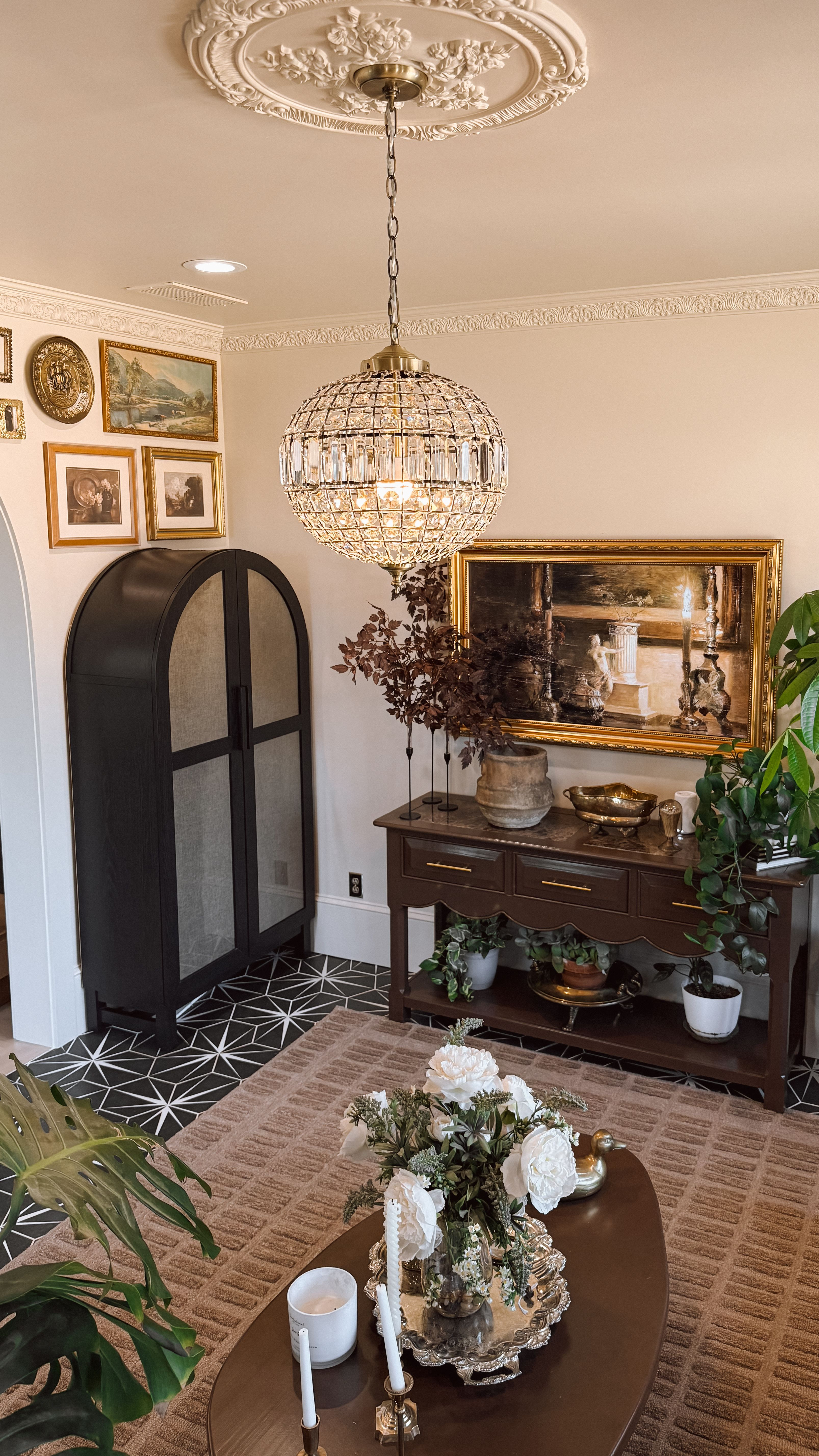 I threw some fabric on these cabinet doors and now it’s the best storage solution for all my pretty glassware and random hosting essentials. Truly, a life-changing moment for the clutter. 

 #LTKCyberWeek #LTKHome #LTKSaleAlert