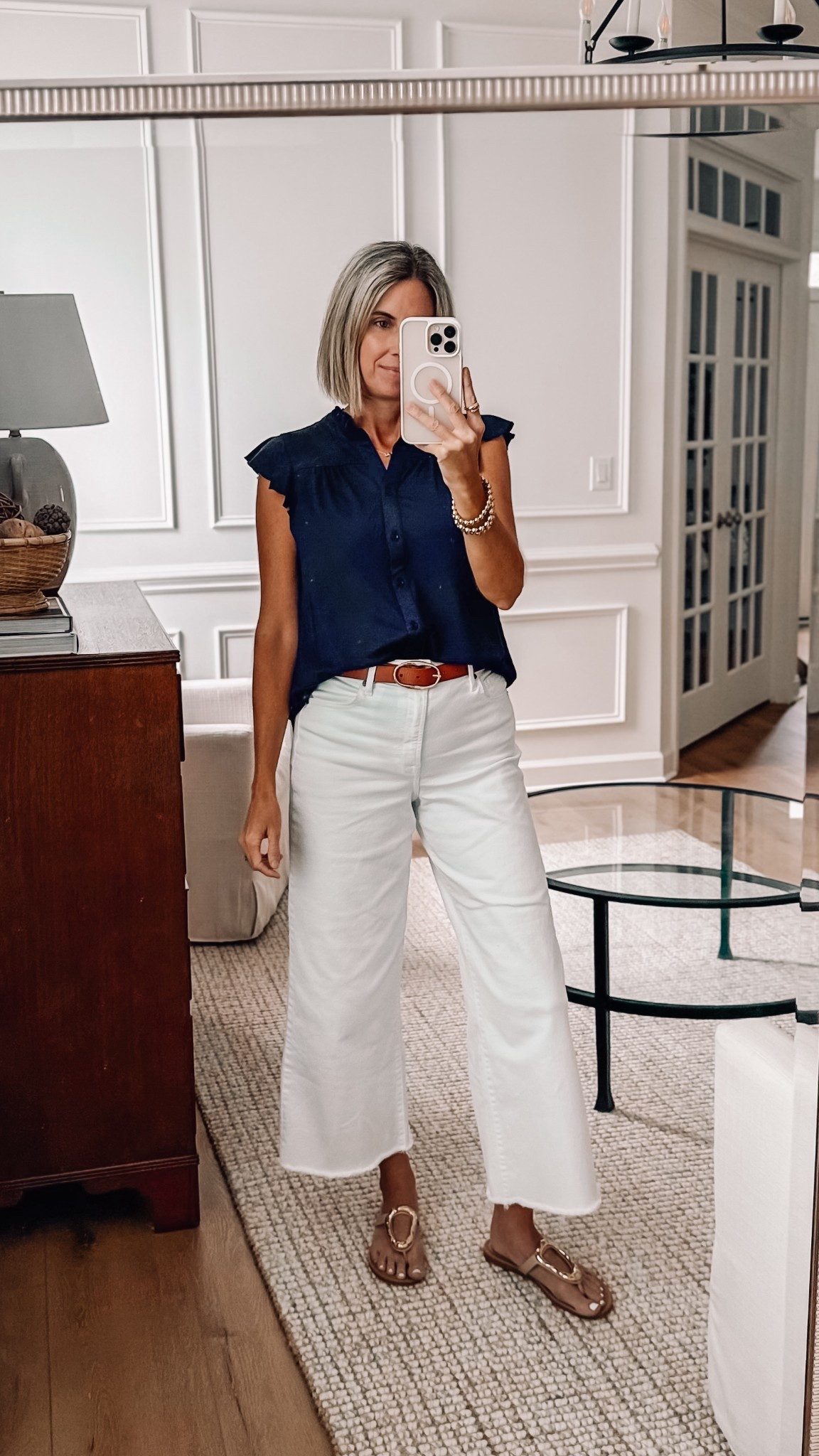 Amazon ruffle cap sleeve top has buttons all the way down and comes in other colors. Wearing a small 


#LTKSeasonal #LTKOver40 #LTKFindsUnder50