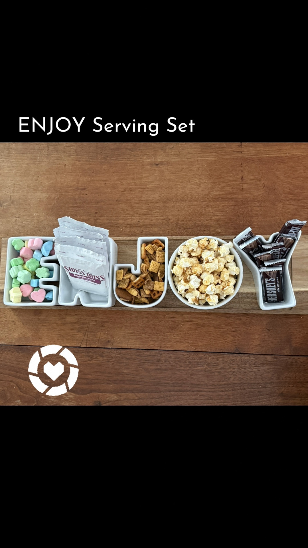 This is one of my favorite serving sets! I love the letters, they make it fun, and they’re easy to clean. 
The set comes with 5 porcelain bowls shaped like letters and the wooden serving tray. 
I use this whenever possible: home entertaining, holiday parties, for the topping at the hot chocolate bar, for snacks on movie night and more!

#LTKFamily #LTKHome #LTKParties