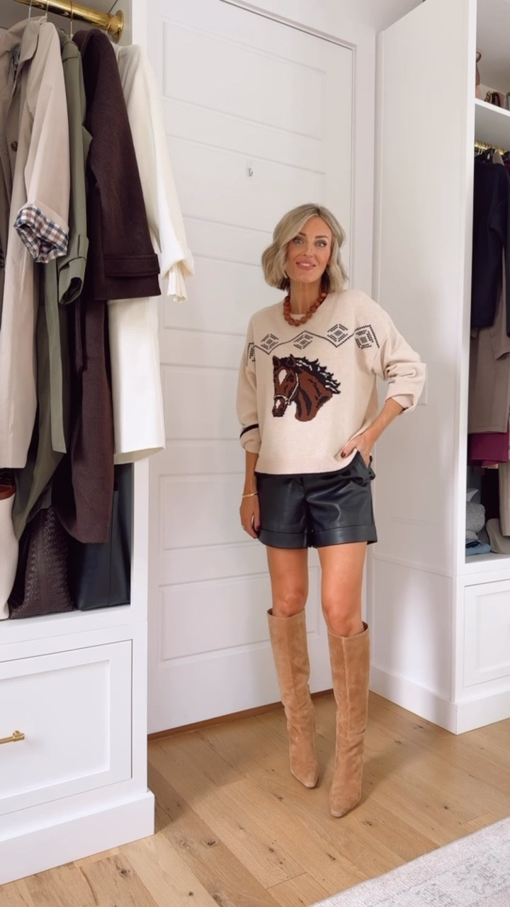 Leather shorts are perfect for a transitional fall look! Wearing S in the sweater & 0 in the shorts. 

Loverly Grey, Loft, faux leather shorts, neutral sweater, fall sweater, stitched sweater, fall outfit ideas, fall fashion, game day outfit ideas, suede boots, tall boots, fall boots 