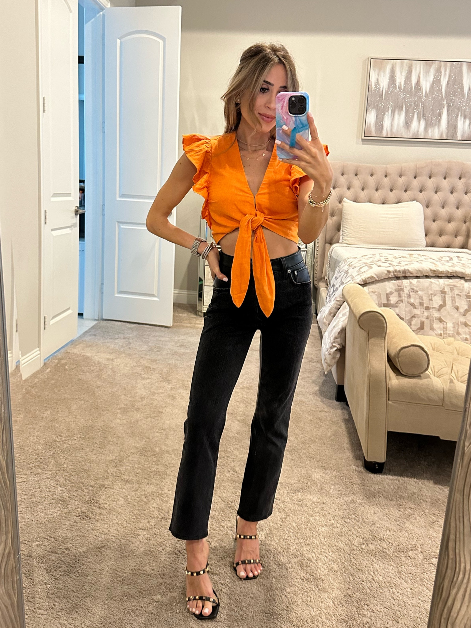 Vacation outfit, resort wear 
Cropped orange top size xxs, black ultra high rise jeans size 24 short use code AFBELBEL 

#LTKunder100 #LTKunder50 #LTKsalealert