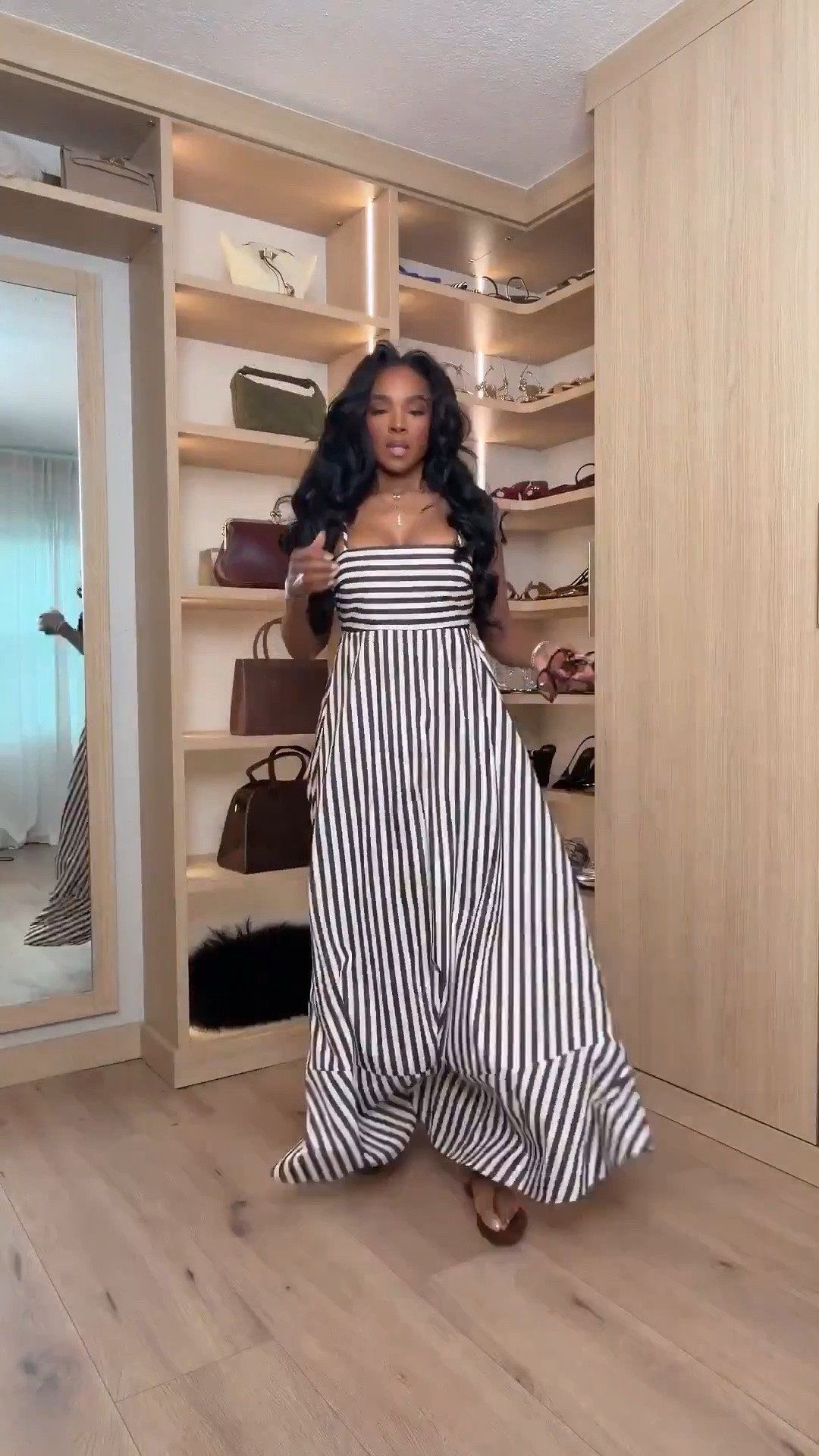 Hi Babes!

This dress is giving European summer, yacht day, and luxury vacation all in one look 🤍🖤✨

The vertical stripes are so flattering, the smocked bodice hugs in all the right places, and the flowy skirt creates the prettiest movement when you walk. This is one of those dresses that looks designer without the designer price tag.

Where to wear this:
• European vacations
• Resort dinners
• Summer weddings
• Beachside brunch
• Cruise nights

Style tip: Pair with woven sandals, oversized sunglasses, and a structured brown bag for that effortless old-money summer aesthetic.

Undergarments: Strapless bra or nipple covers recommended. Nude seamless briefs for a smooth finish.

Everything is linked below

xx Kira | IG: KirasFashionFinds

34D - 27 - 40 • Size Small or 4