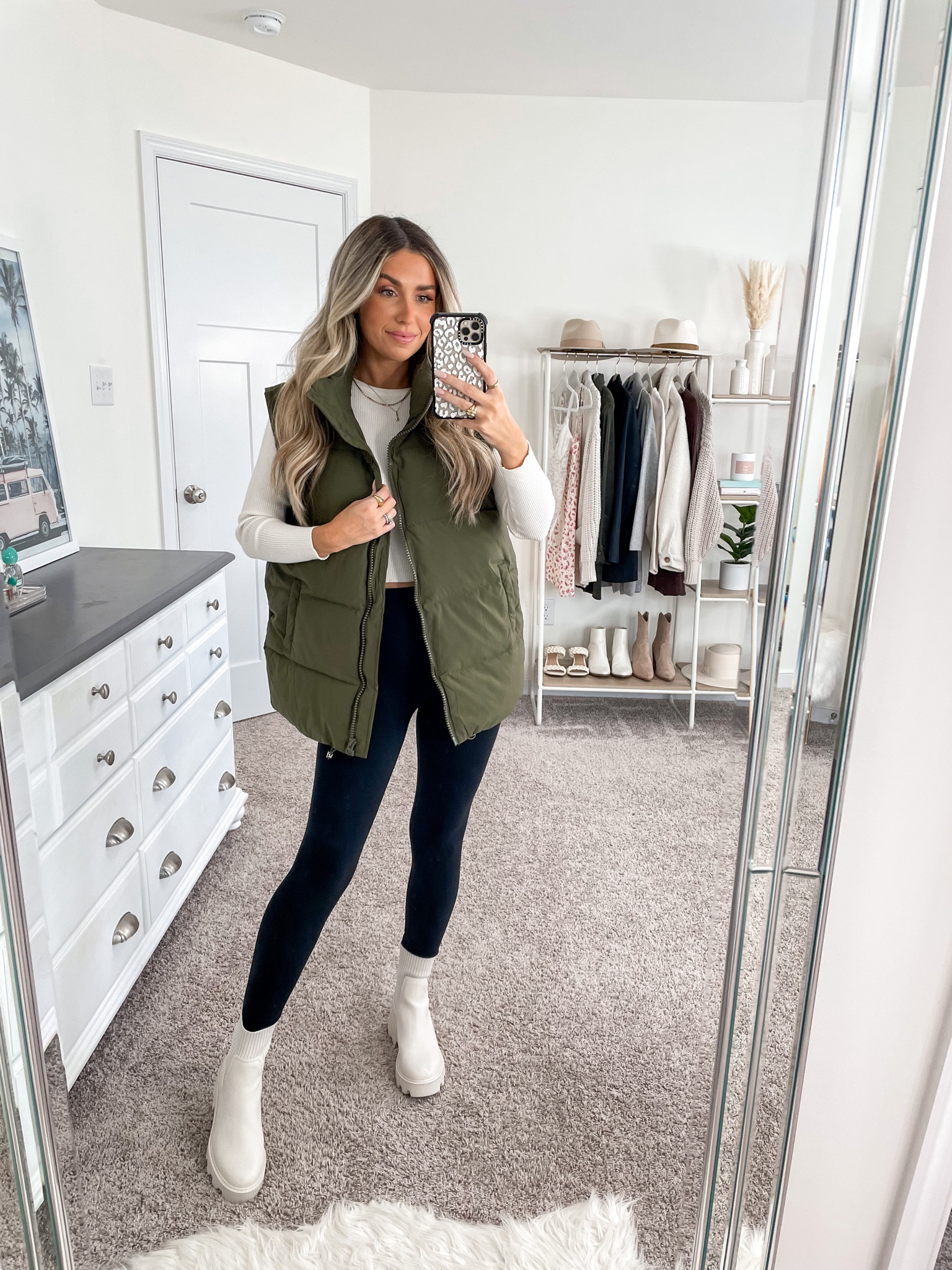 Ten ways to style this green puffer vest from amazon 🫶🏼 look 8/10 
+ puffer vest: small
+ top: s/m
+ leggings: xs 25 inch 
+ boots: true to size 

#LTKfindsunder50 #LTKSeasonal #LTKfindsunder100