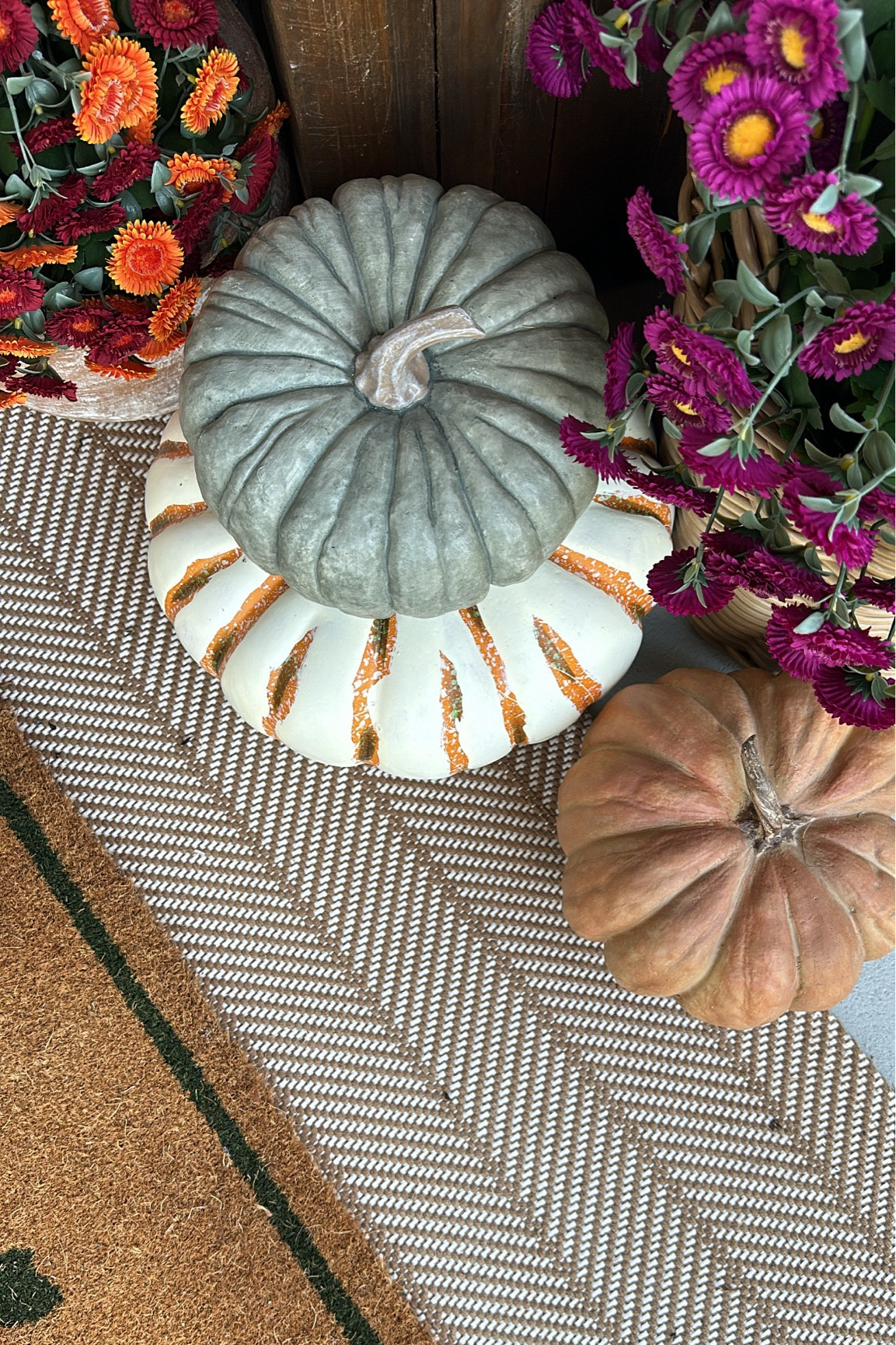 My bottom fall layering rug is from Target!  It’s a great price and not meant for outdoor but feels just like an outdoor rug.  It has held up amazingly on our covered porch.  Sadly, the top pumpkin rug from Walmart has been out of stock for a couple weeks.

#LTKSeasonal #LTKHome #LTKFindsUnder50