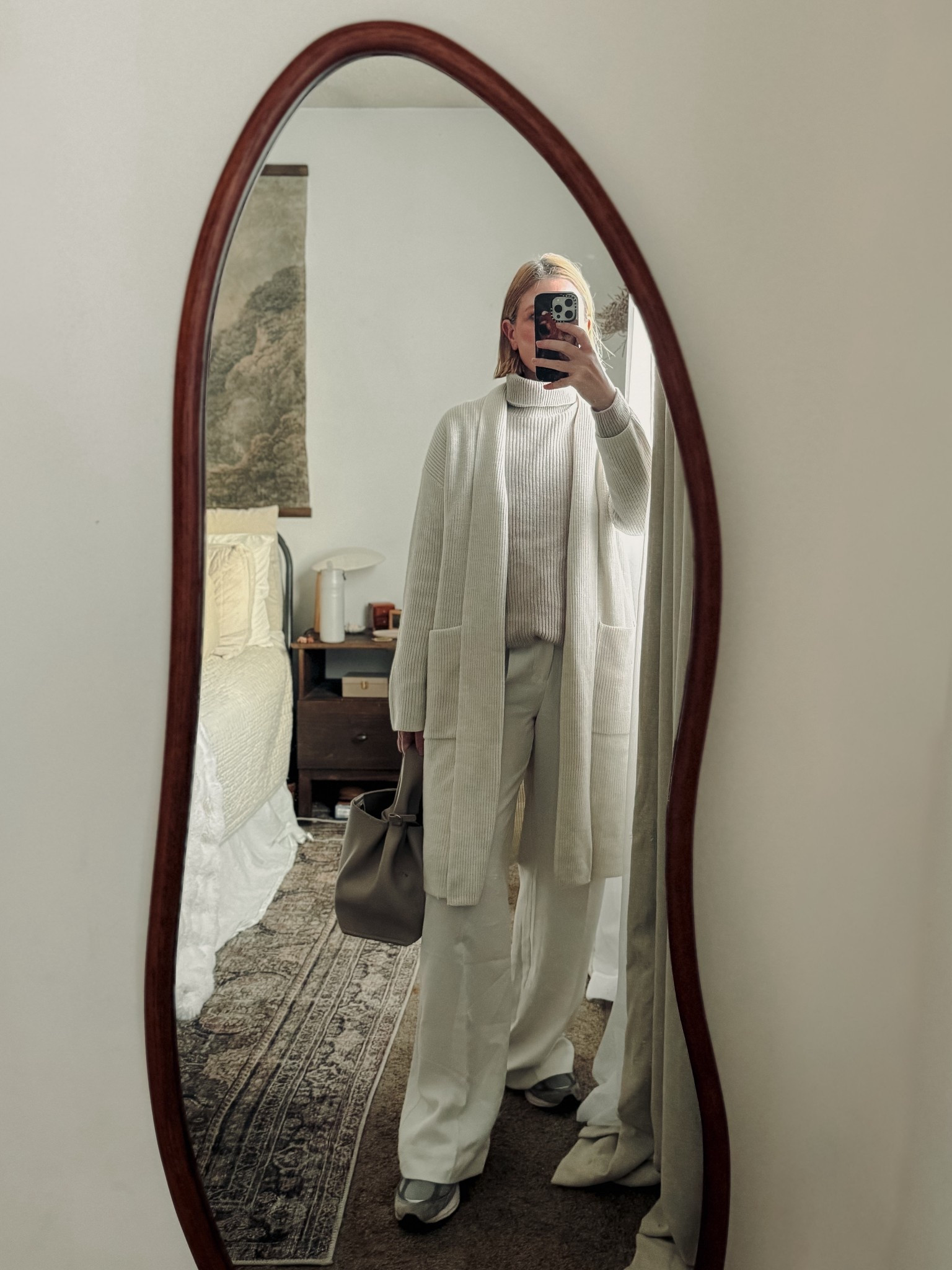 Neutral monochrome outfit 🤍 cozy turtleneck sweater, long cardigan, and wide-leg trousers for an elevated everyday look. Perfect minimalist capsule wardrobe outfit for fall and winter.