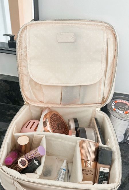 This super cute make up travel case is perfect for any trip! Can fit so many products! #amazon #amazonprime

#LTKstyletip #LTKbeauty #LTKsalealert