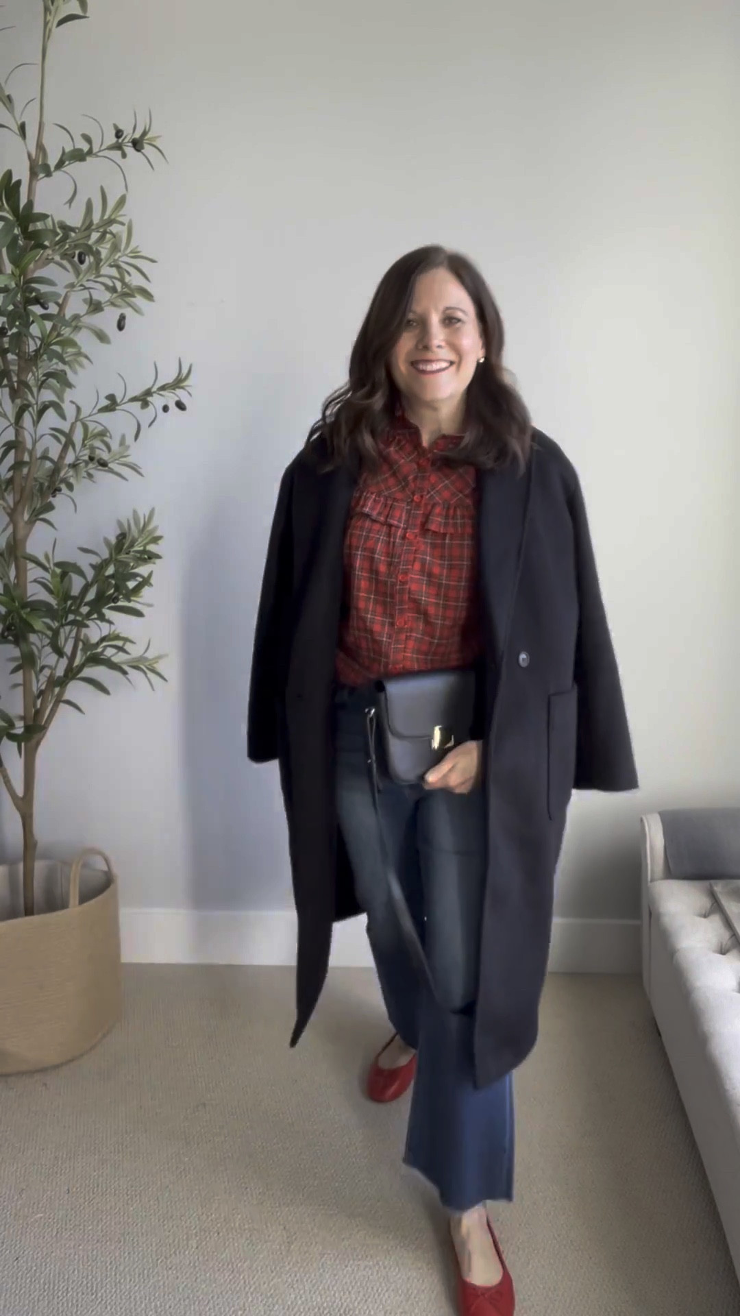 I love a classic red plaid Christmas blouse, and I had been eyeing this one from Social Threads for a few weeks. When they sent it to me to try, I was genuinely excited. If you follow me here, you may have already seen that I wore it out to dinner and a movie on Saturday night (with the same jeans). It hits right at the hip, which makes it easy to wear untucked or with a simple front tuck.

I paired it with my well loved Risen kick crop jeans, also from Social Threads. They run true to size. The forecast here says Christmas temps may be a little warmer, so ballet flats may be an option for the holiday! 

#LTKOver40 #LTKMidsize #LTKHoliday