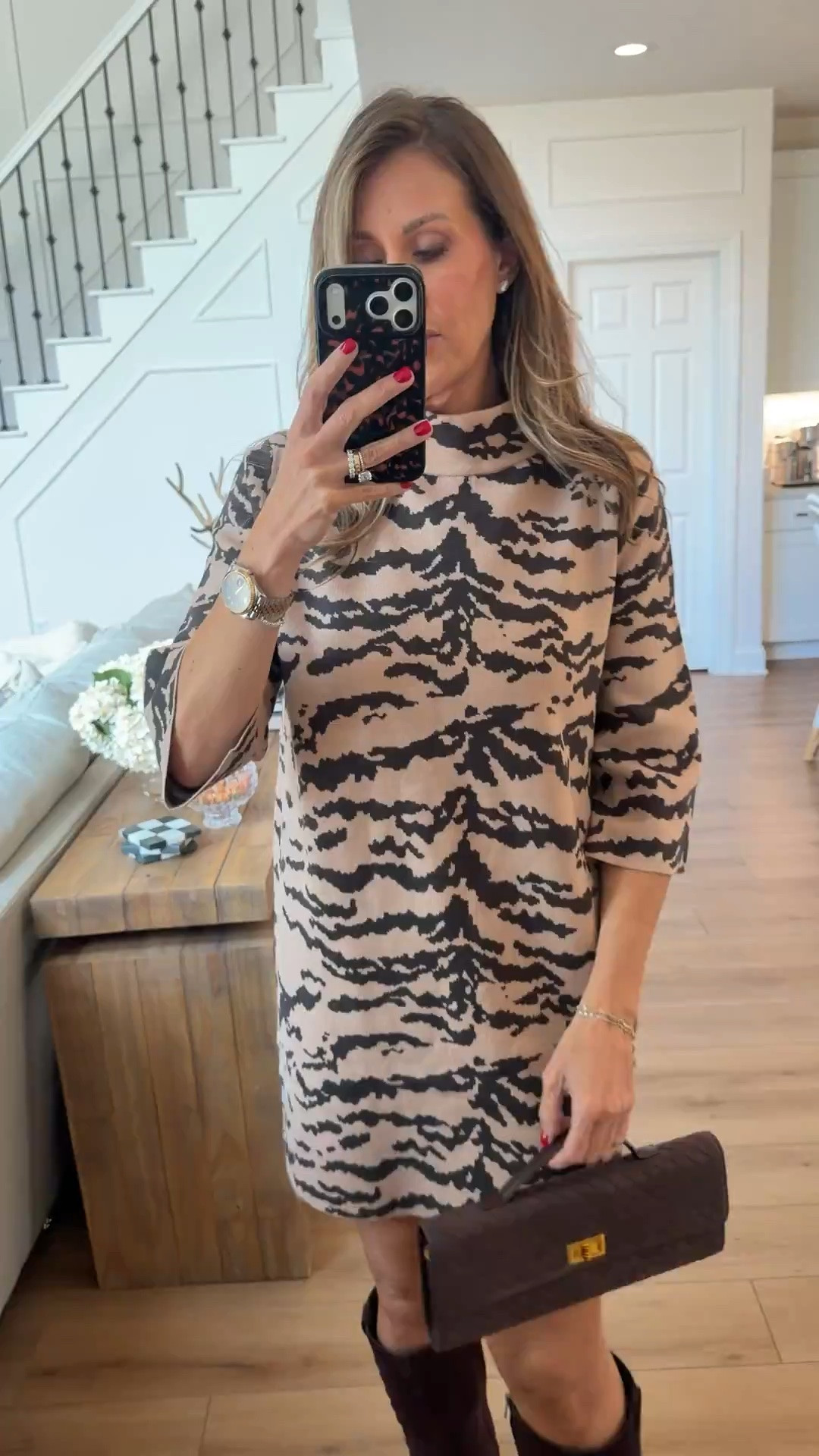 The perfect fall outfit 🤎 This neutral animal print mini dress paired with chocolate brown knee-high suede boots is such a chic combination for fall! Style it with a structured handbag and gold jewelry for an effortlessly elevated look.

fall outfit, animal print dress, brown suede boots, knee-high boots, neutral fall fashion, fall outfit ideas, chic everyday style, affordable fall finds, themominstyle