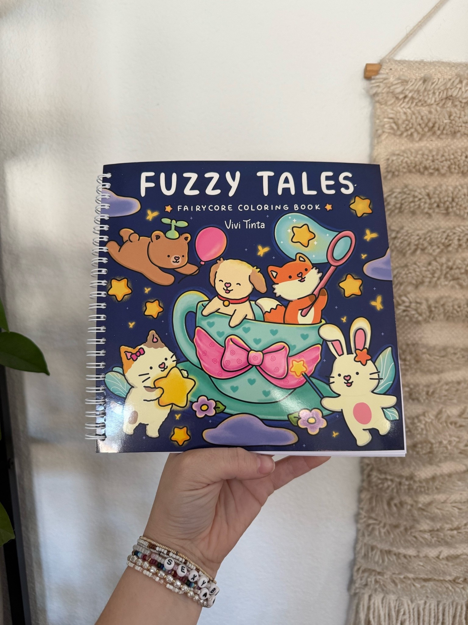 Fuzzy Tales Coloring book with spiral spine! It makes coloring so much easier without having to hold down the cover page to color!

#LTKselfcare #LTKHome