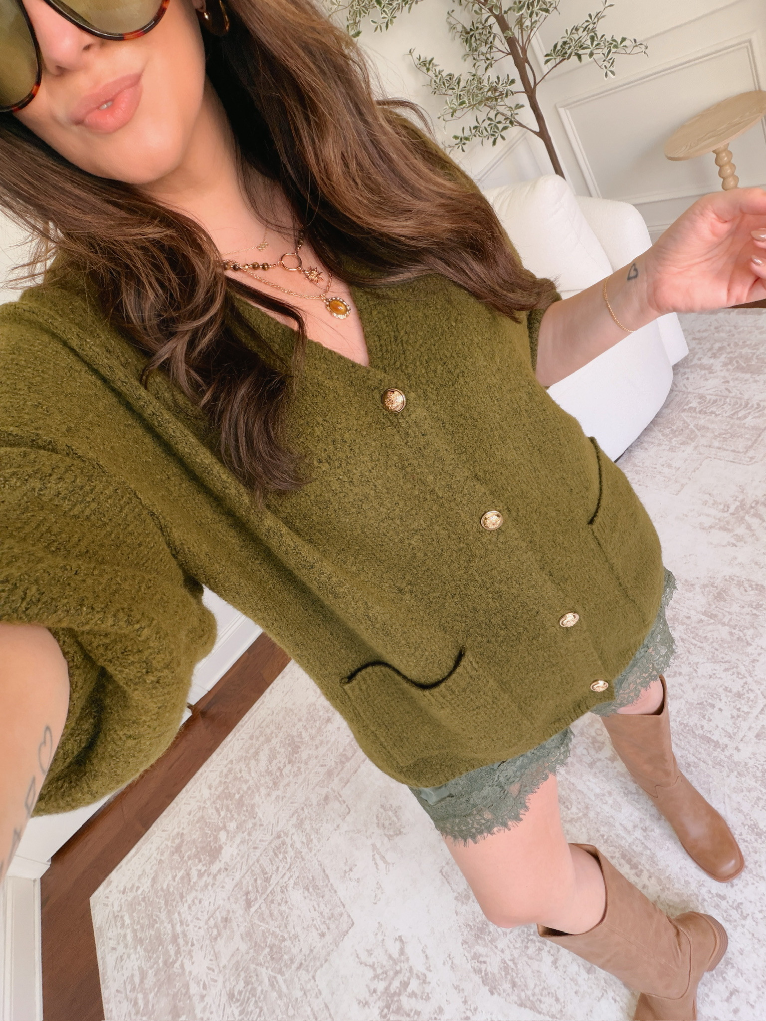 Wearing a large in the cardigan and an XL in the shorts 

 #LTKSeasonal #LTKMidsize