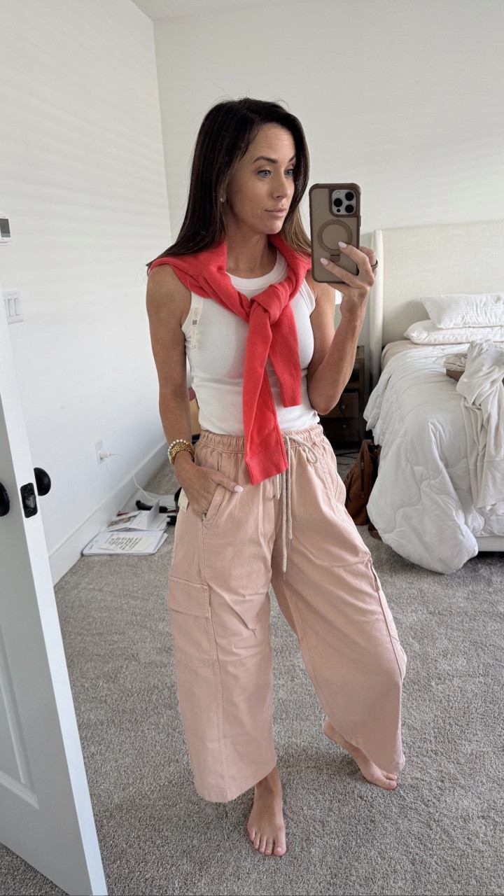 Classic white tank paired with pink drawstring barrel pants and a pop of coral in the cardigan is my new favorite summer outfit.

#LTKootd #LTKTravel #LTKSeasonal