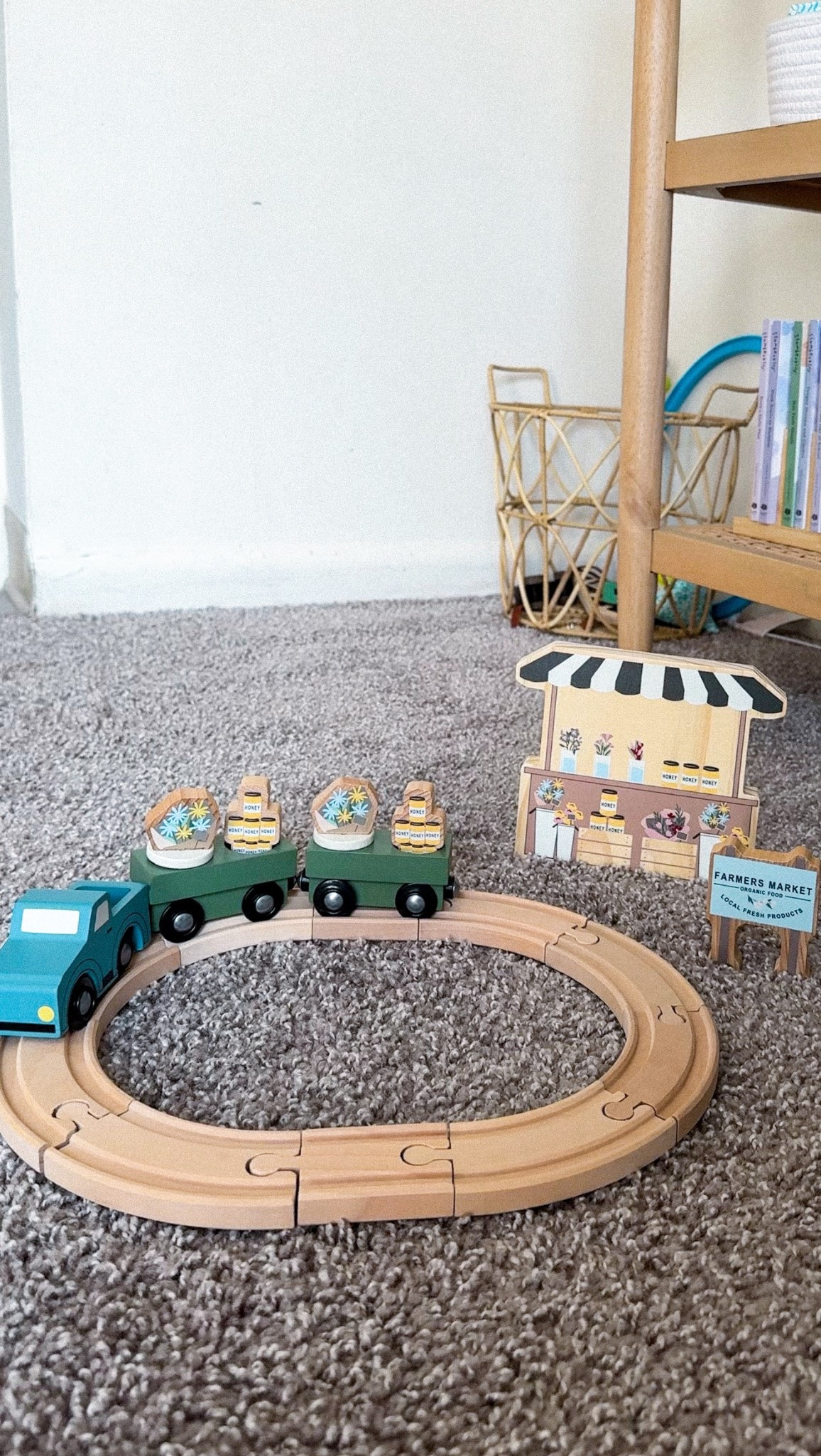 found the cutest lil wooden farmers market play set on clearance at target today + am obsessed! it was only $9 for the 21pc set 🥹 

#playroom #toystorage #toyshelf #toyorganization #woodentoys #montessoritoys #hearthandhand #targetfinds #targetclearance  



#LTKSaleAlert #LTKHome #LTKKids