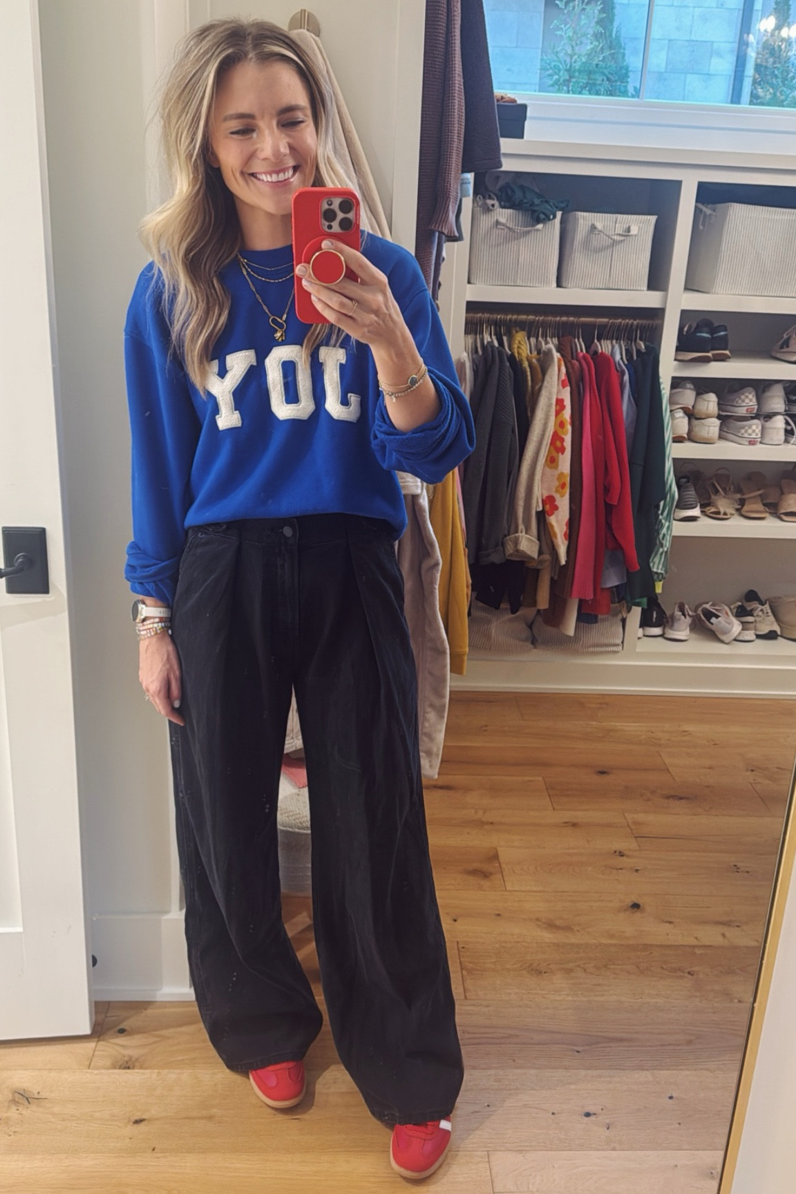 Wearing a medium in the sweatshirt (I have it tucked up a bit here but it’s not a cropped fit), and I sized down in the trouser jeans to a size 4. Also sized down in the Sambas sneakers a full size. 