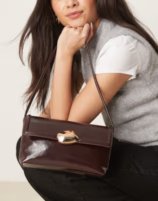 ASOS DESIGN molten hardware closure shoulder bag in brown | ASOS (Global)