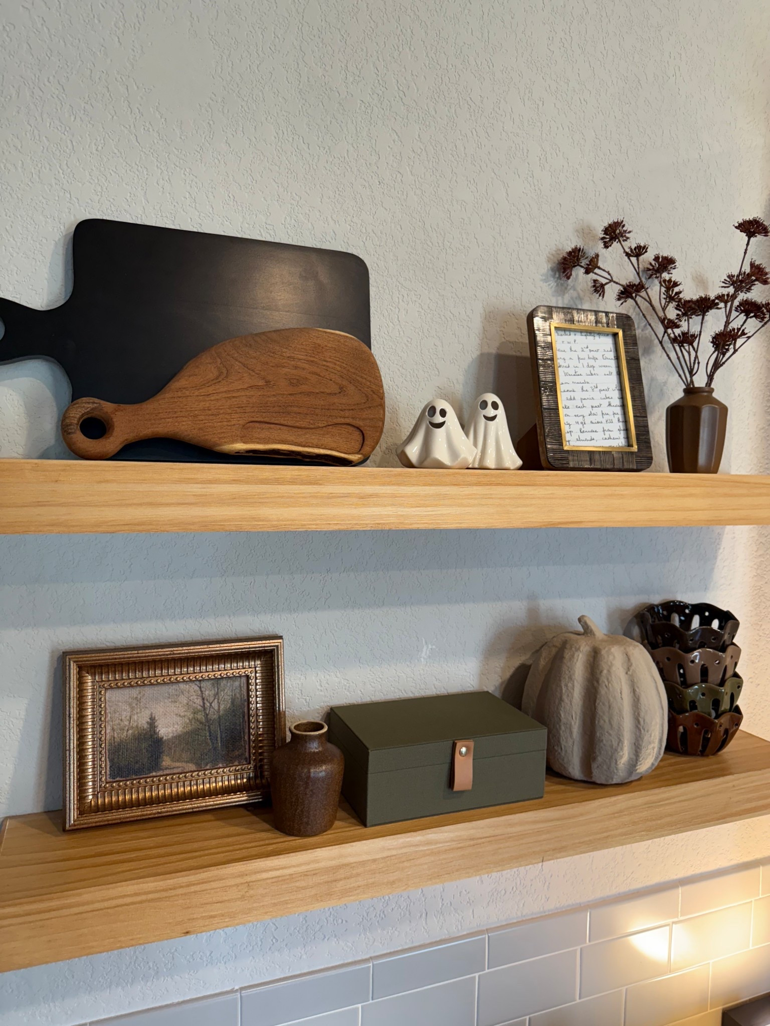 Floating Shelf Decor! Black cutting board is from At Home & little ghost are from Home Sense! Fall home decor, fall decor, kitchen shelves, kitchen decor

#LTKHome