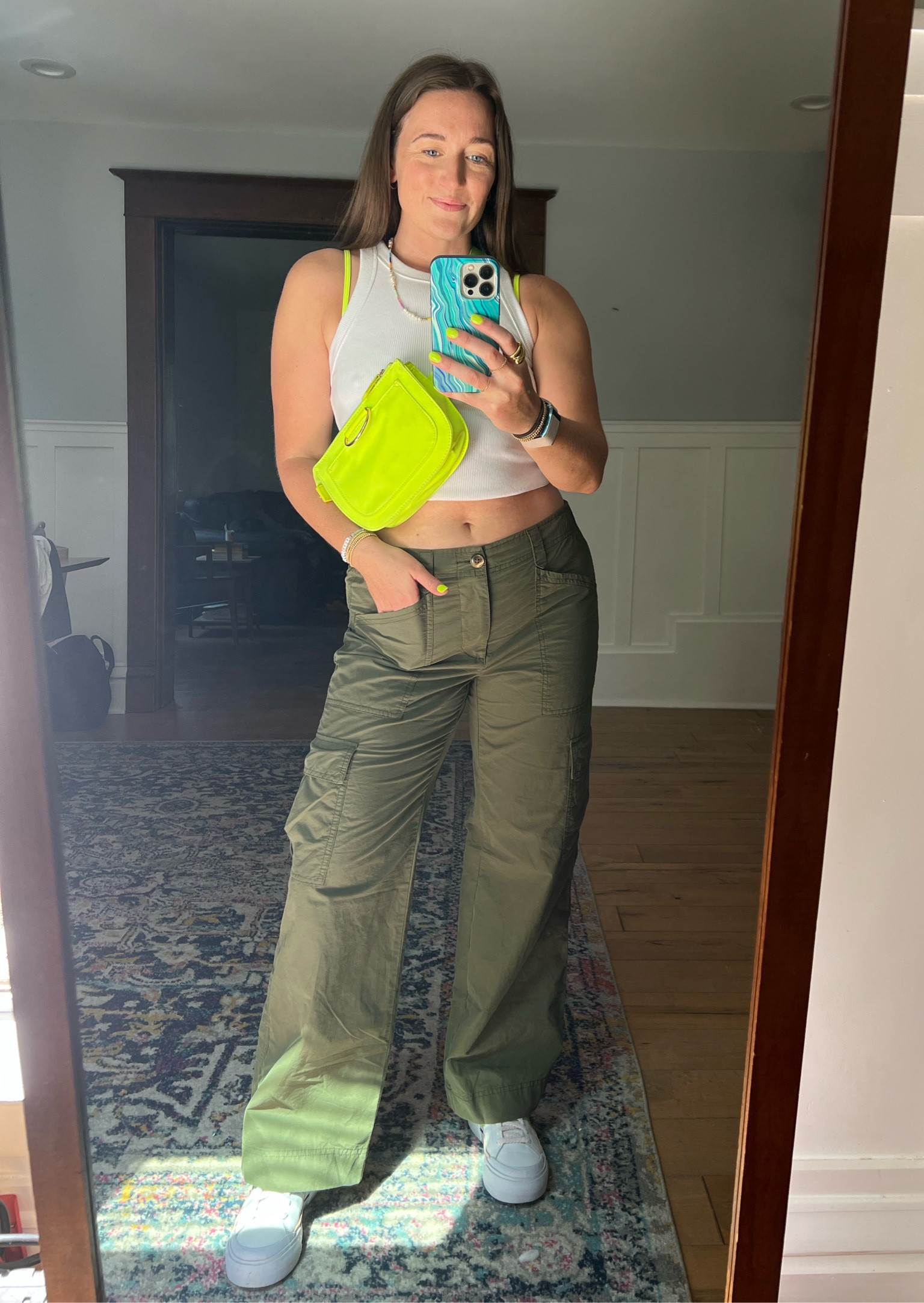Your girl loves a cargo pant. Linking the exact ones from Old Navy and other similar options. They’re really lightweight and roomy. Wearing a small with room and paired them with neon accents, a simple tank from Aerie and am amazing pair of Nikes!