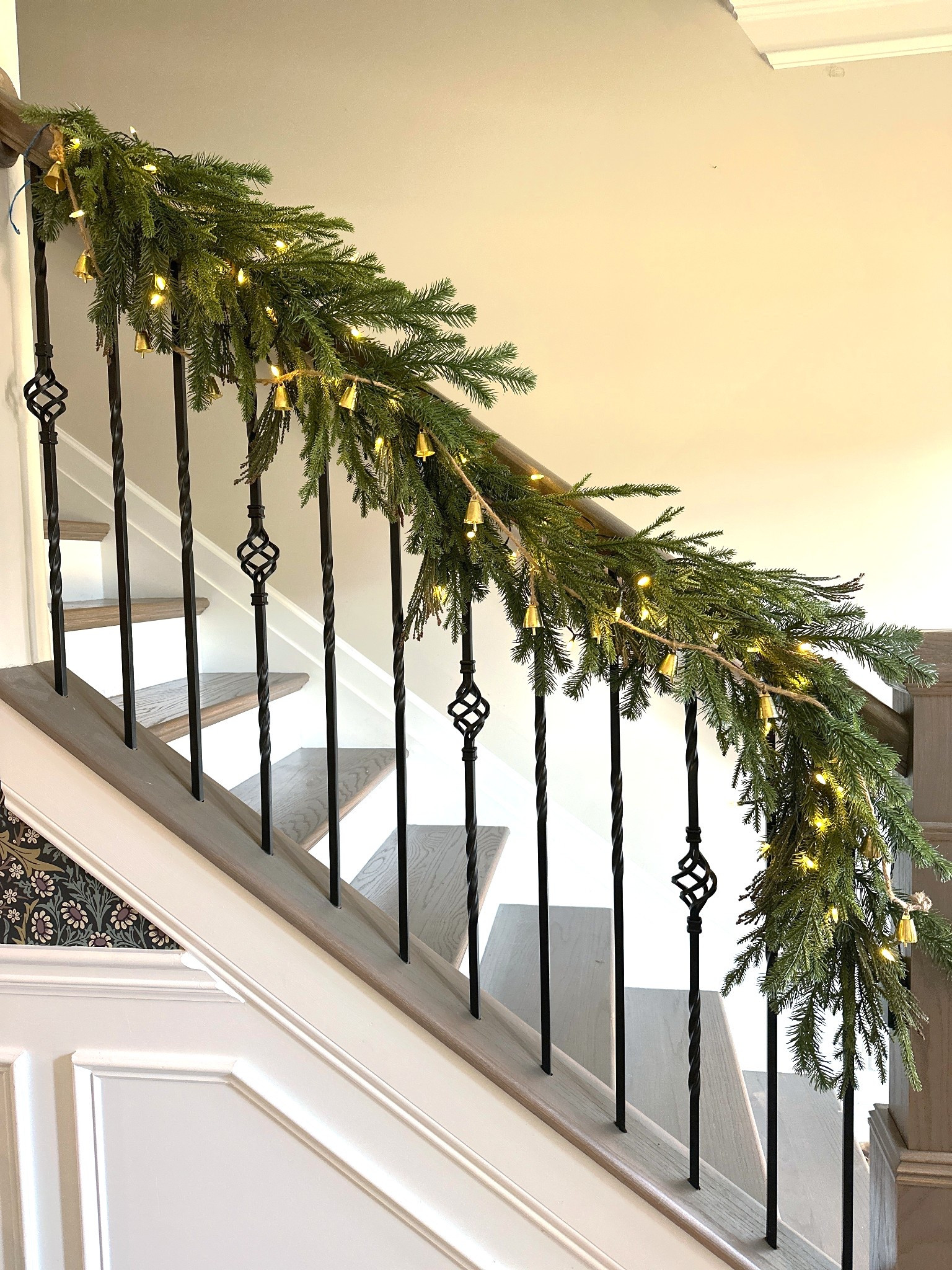 Decked the staircase with the gorgeous garland by Studio McGee x Threshold from Target paired with a bell garland I found at Hobby Lobby and my favorite battery pack lights from Amazon! 😍

#LTKHome #LTKHoliday #LTKCyberWeek