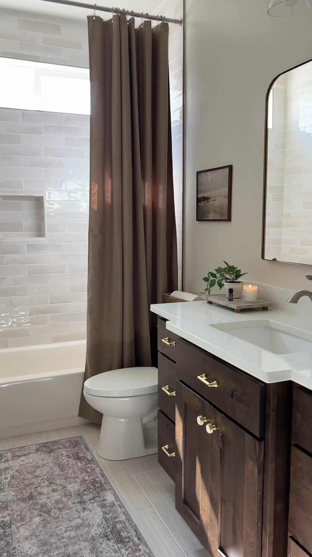 Shop my bathroom remodel on a budget! Products from Amazon, Target, and Home Depot.

Shower tile | taupe shower curtain | wall art | gold mirror and hardware 

#LTKHome #LTKFamily #LTKVideo