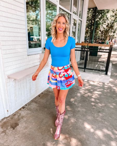 Obsessed with these metallic pink cowboy boots paired with my multicolored skirt/skort and blue scoop neck top 

#LTKunder100 #LTKunder50