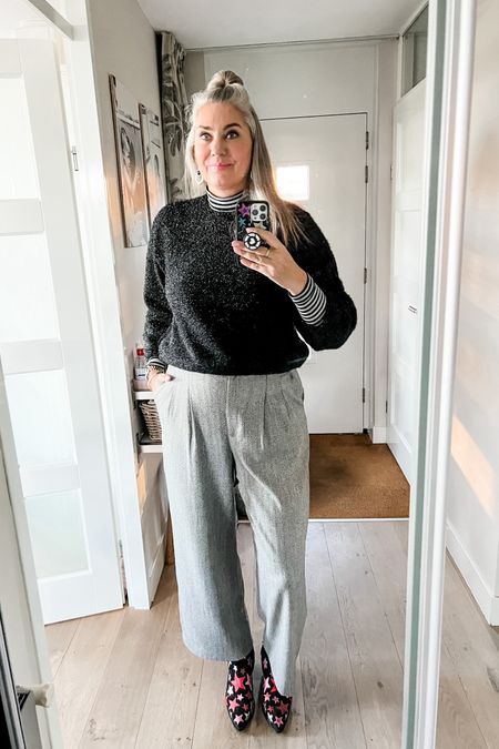 Ootd - Tuesday
Black glitter sweater over a lightweight turtleneck shirt paired with grey wide pants and western boots with stars from DWRS x Ramijntje. 

#LTKeurope #LTKover40 #LTKstyletip