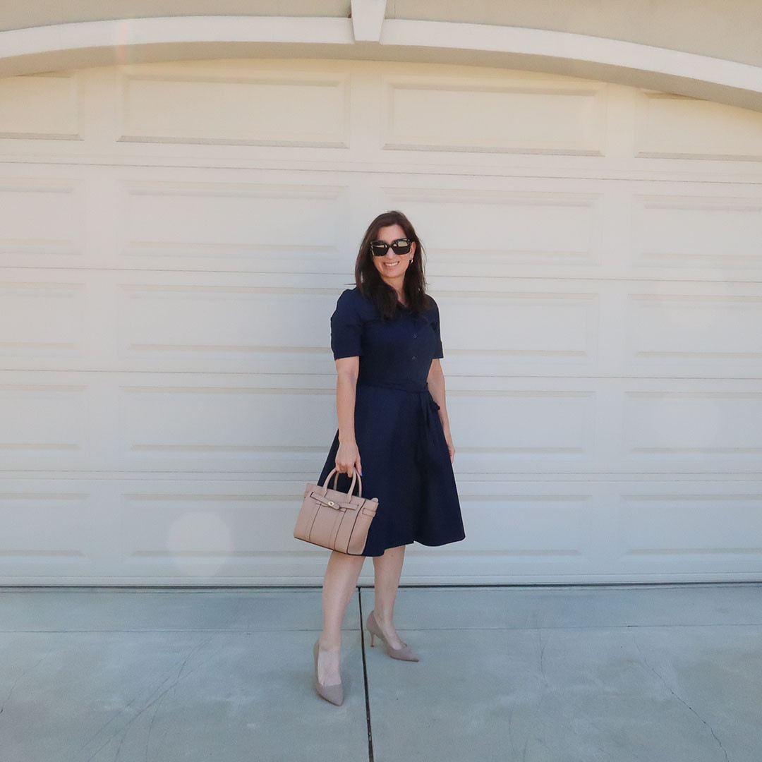Love this navy shirt dress for the office and events. It's so comfy and easy to wear. Love! 

 #LTKootd #LTKOver40 #LTKWorkwear