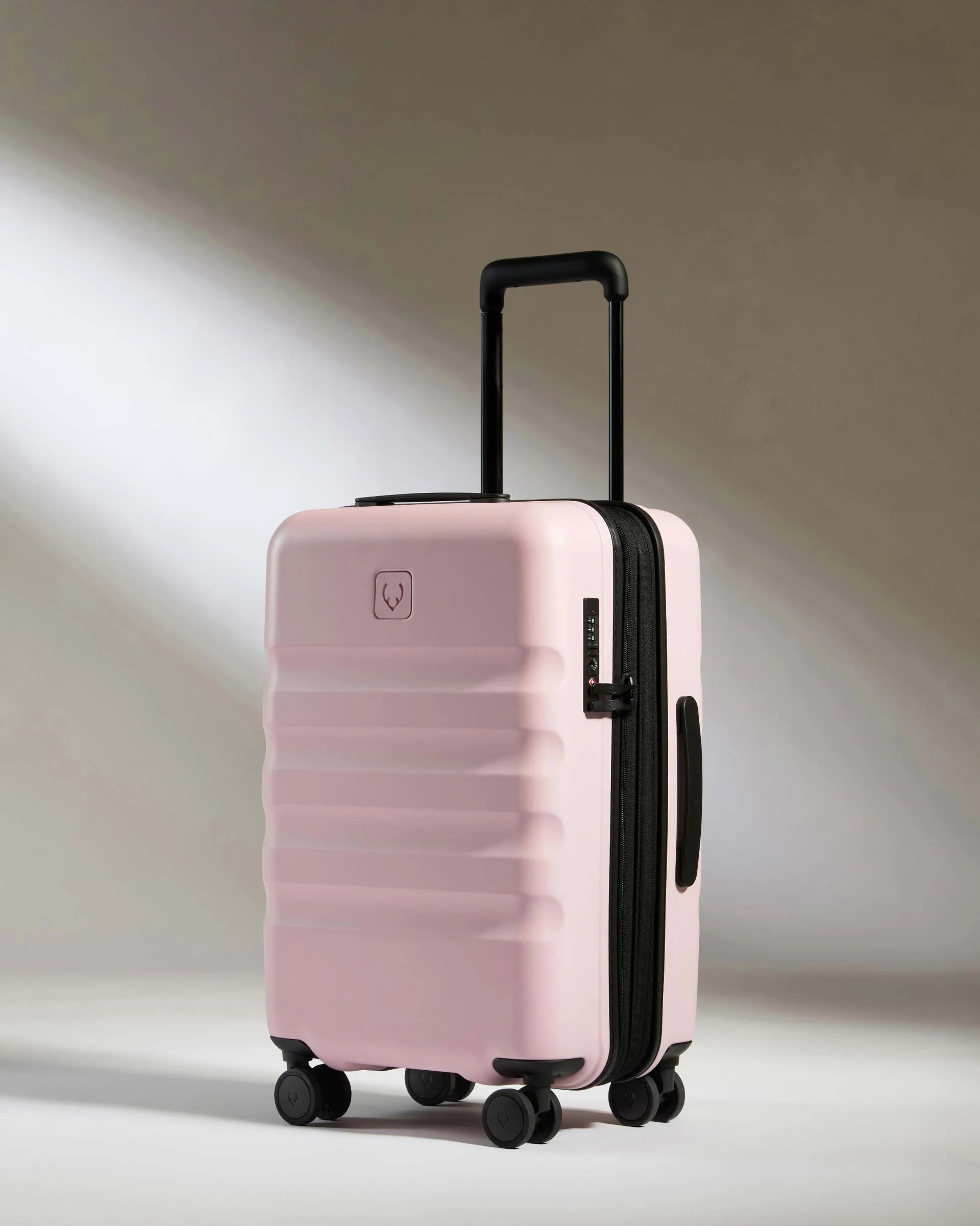 Expandable Carry-on Luggage in Pink - Icon Stripe | Lightweight & Hard Shell Suitcase | Antler USA
