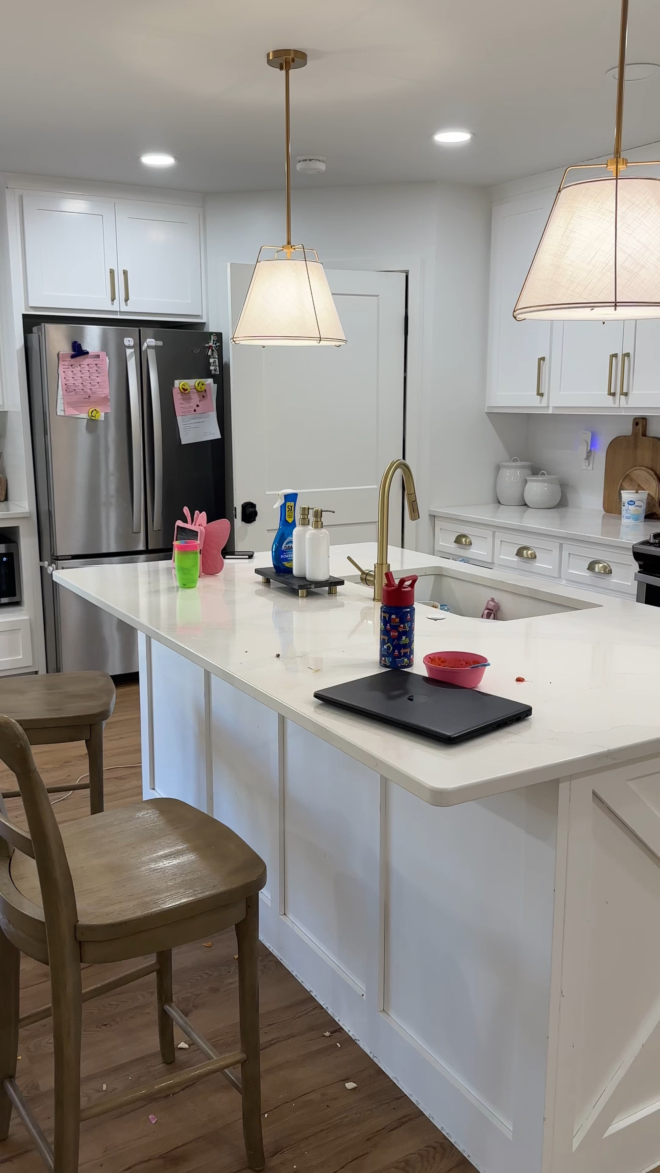 White and gold kitchen 
Gold island pendant 

#LTKHome #LTKVideo