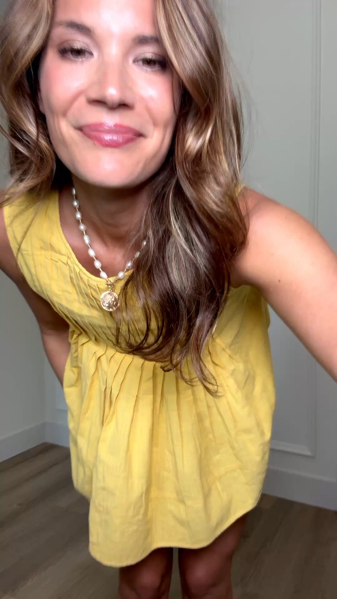 This sunny yellow tank is such a fun way to add color to your summer wardrobe. The pleated details and flowy fit make it feel elevated while still being lightweight and easy to wear with white shorts, denim, or your favorite summer bottoms.

Yellow tank top, Summer outfit idea, White shorts outfit, Bright summer fashion, Casual chic style, Vacation outfit, Lightweight summer top, Everyday outfit inspiration, Warm weather style, Resort wear look, Feminine summer top, Summer wardrobe staple, StangandCo

#LTKootd #LTKSeasonal #LTKTall