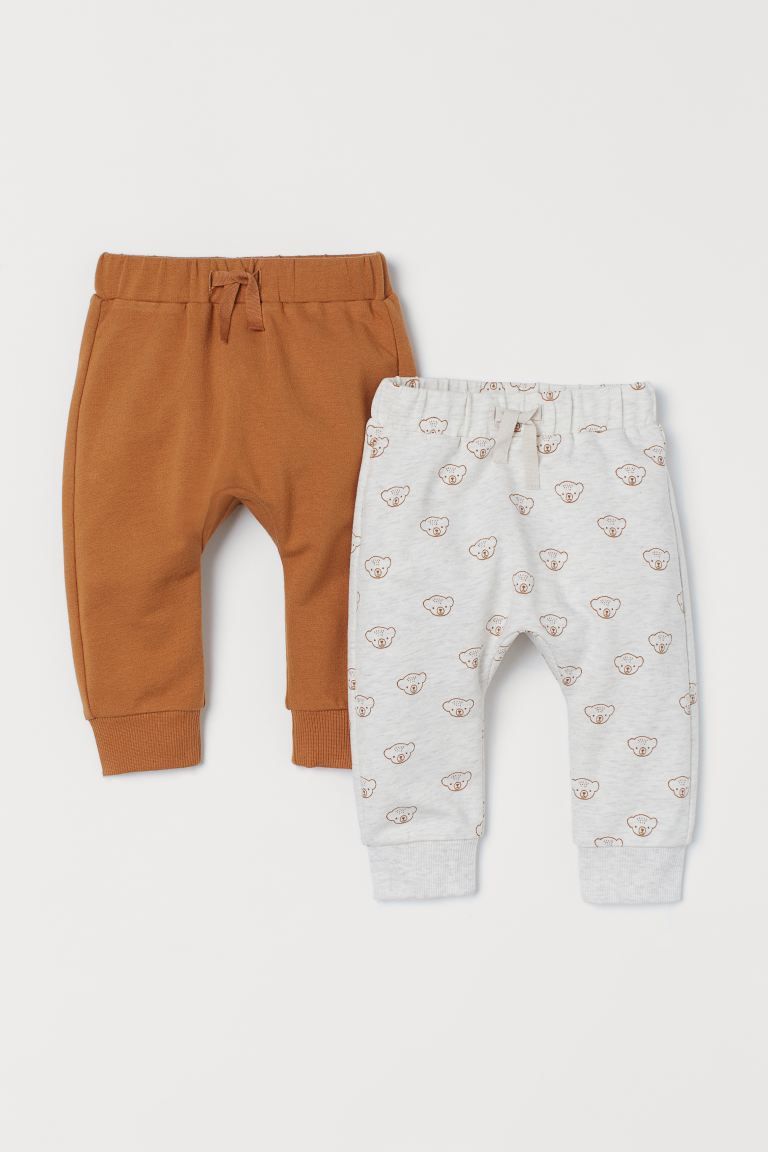 Sweatpants in soft, organic cotton. Covered elastic at waistband and foldover cuffs at hems. One ... | H&M (US + CA)
