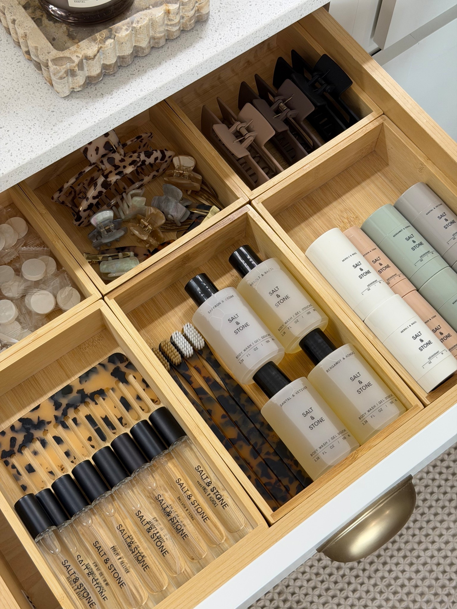bathroom drawer organization ideas ✨ Chic vanity storage with bamboo drawer dividers, luxury bath essentials, hair clips, travel toiletries, and countertop styling. Love creating a clean, organized bathroom that feels like a boutique hotel. #LTKHome #BathroomOrganization #DrawerOrganization #VanityOrganization #GuestBathroom #HomeOrganization #BathroomDecor #LuxuryHomeStyle #NeutralHomeDecor #OrganizedHome

#LTKBeauty #LTKHome