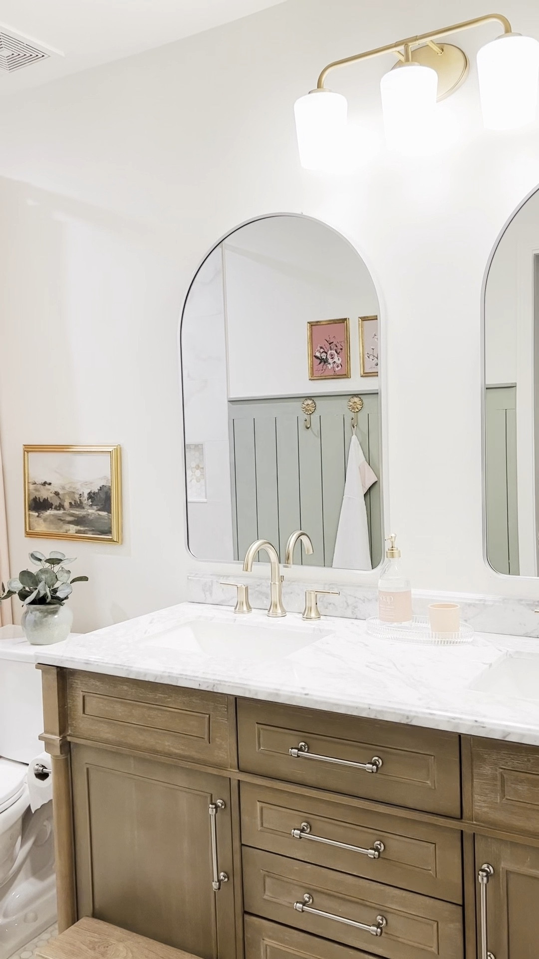 Our kids bathroom got a no demo makeover. We updated the lighting, mirrors, cabinet hardware, new delta faucets in champagne bronze and added a pink shower curtain from Amazon 

#LTKKids #LTKHome #LTKStyleTip