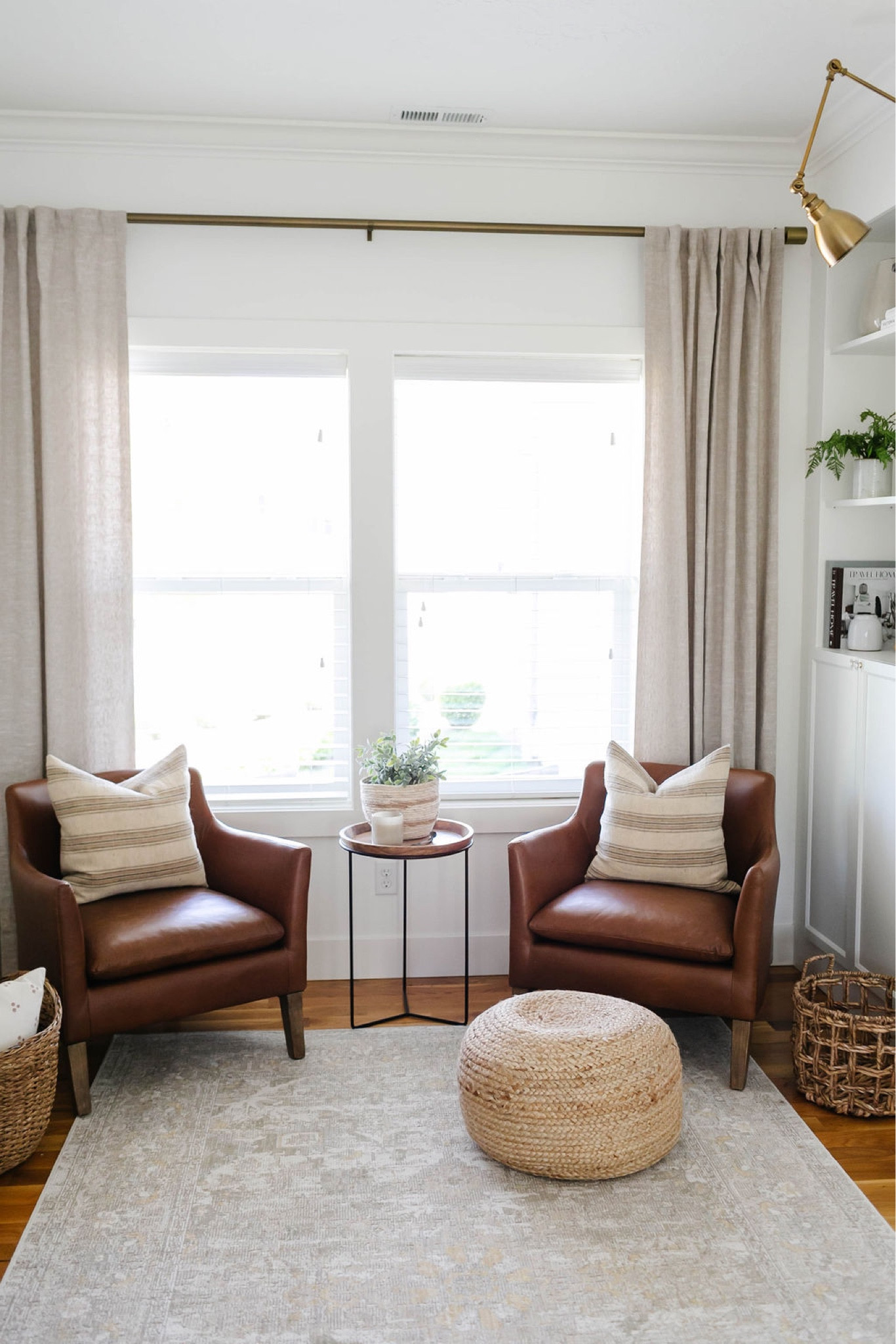 Pottery Barn leather chair, fall decor, Loloi Chris Loves Julia area rug, woven ottoman, throw pillows, baskets, Pottery Barn drapes, neutral curtains, home decor, living room decor, family room decor 

#LTKsalealert #LTKSeasonal #LTKhome