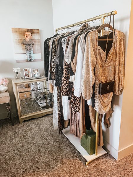 Loving this gold pipe clothing rack—it’s helped me free up space in my closet and looks so chic! What do you guys think of it? ✨ 

#spacesaver #closetmakeover #clothingrack #bloggerstyle #roomessentials #amazonfinds 