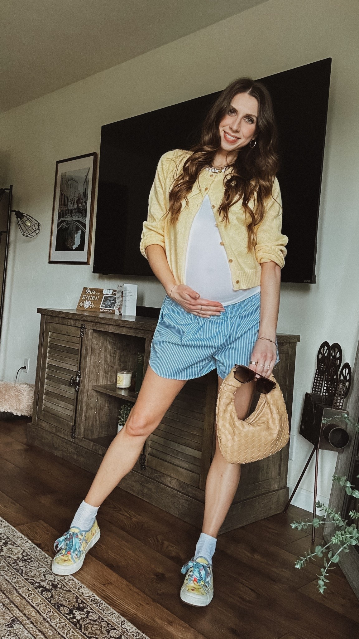this outfit turns out to be pregnancy friendly as long as you're okay will rolling the shorts down one fold. 

I'm wearing size Small in shorts and size Small in the yellow sweater. 

I've had the other accessories for a while, but I'll tag similar items. 🤍 

(These LoveShackFancy x Superga shoes are from a few years ago) 

#LTKBump #LTKStyleTip #LTKPetite