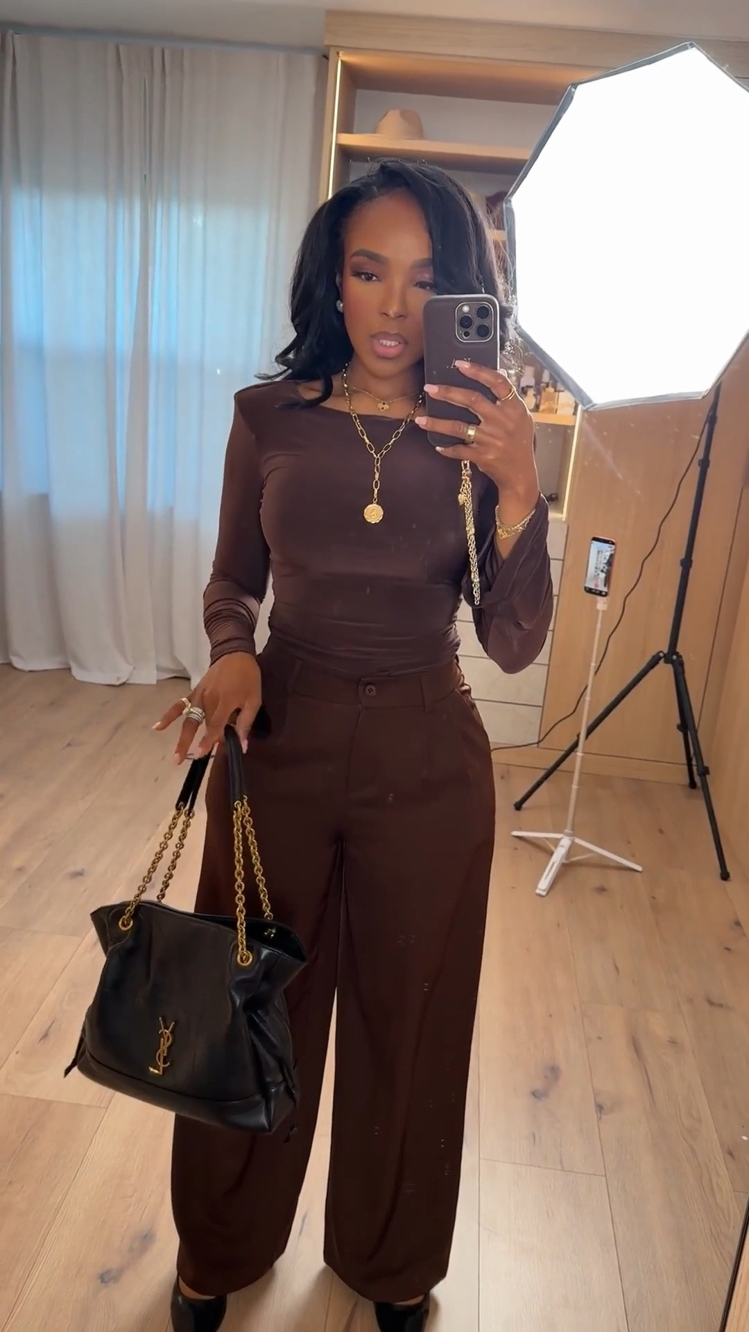 Scroll to shop this chocolate brown monochrome outfit featuring a fitted long sleeve top paired with tailored wide-leg trousers for a polished, elevated look. Matching sets like this are a staple you can style multiple ways with heels, sneakers, or layers, making it a smart long-term piece where the cost per wear continues to drop.

Perfect for work outfits, dinners, date nights, travel looks, or elevated everyday styling.

5'4" | 138 lbs | 34D bust | 27" waist | 40" hips

Follow me on Instagram and YouTube @kirasfashionfinds

