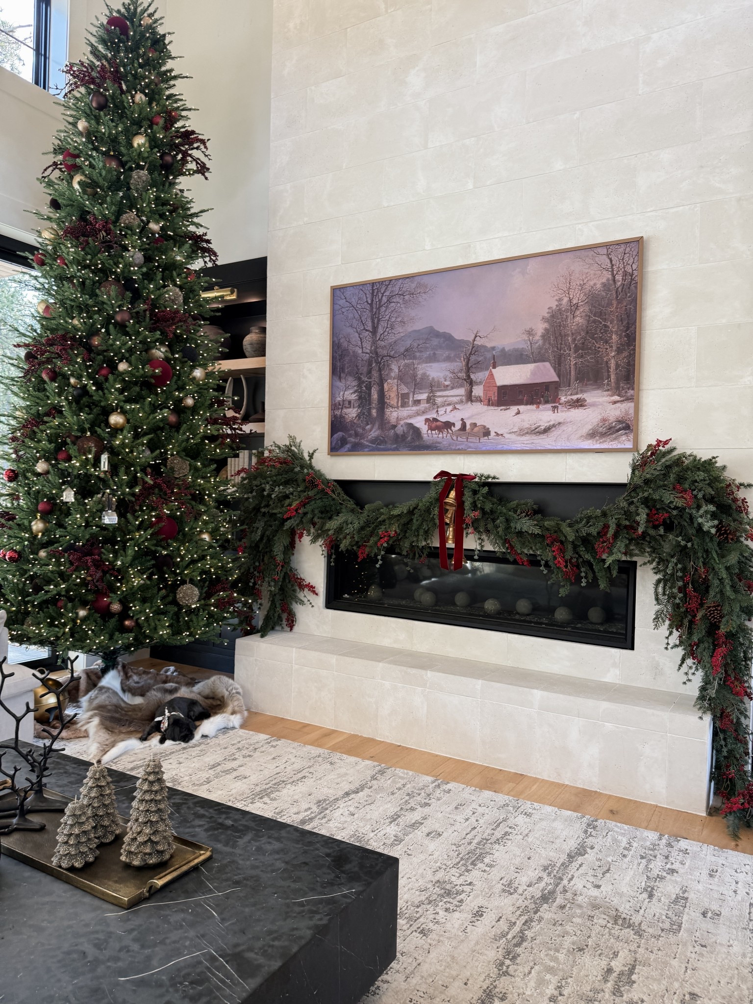 Chompers has claimed his spot under the Christmas tree. The faux berry garland is stunning! We have a metal mantel so I was able to use magnetic hooks to hang the garland. Christmas decor linked below.

#LTKHoliday #LTKSeasonal #LTKHome