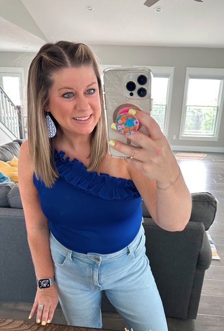 This bodysuit was such a steal- under $15 and comes in multiple color options. It was the perfect choice for a day date with my hubby last weekend! My @cordeliastyled cork earrings were a great match too  

#LTKstyletip #LTKunder50 #LTKFind